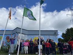 From Rainwater to Runway: Celebrating Our New Green Flag!