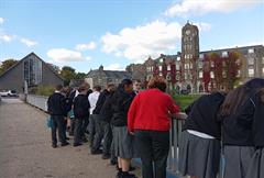Maeve O’Sullivan leads first-year students on a nature walk as part of her Haiku workshop, encouraging them to find inspiration in the world around them.