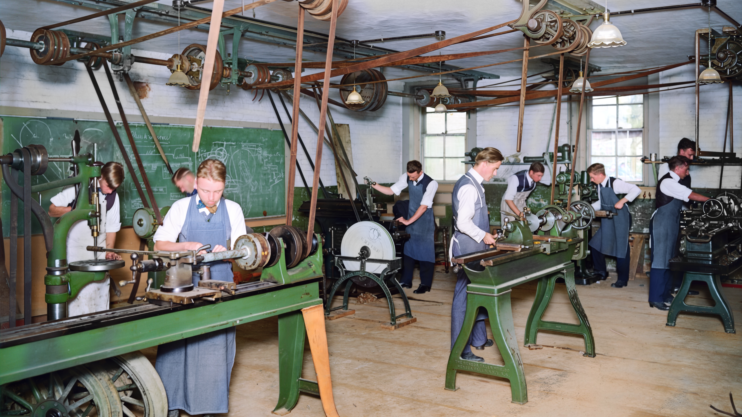 Machine shop c.1910 to a manufacturing image