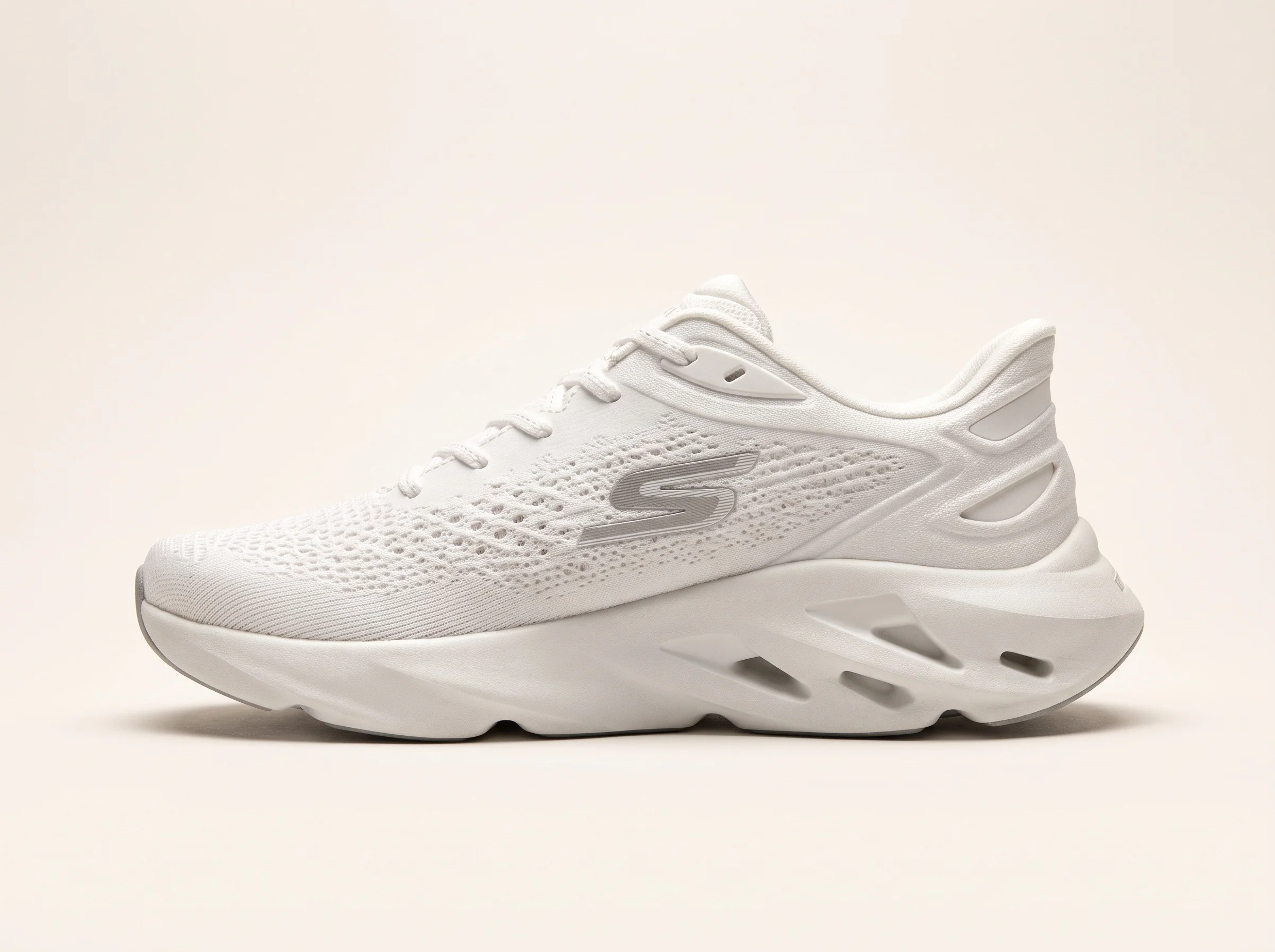 A packshot of the white running shoe used as the reference