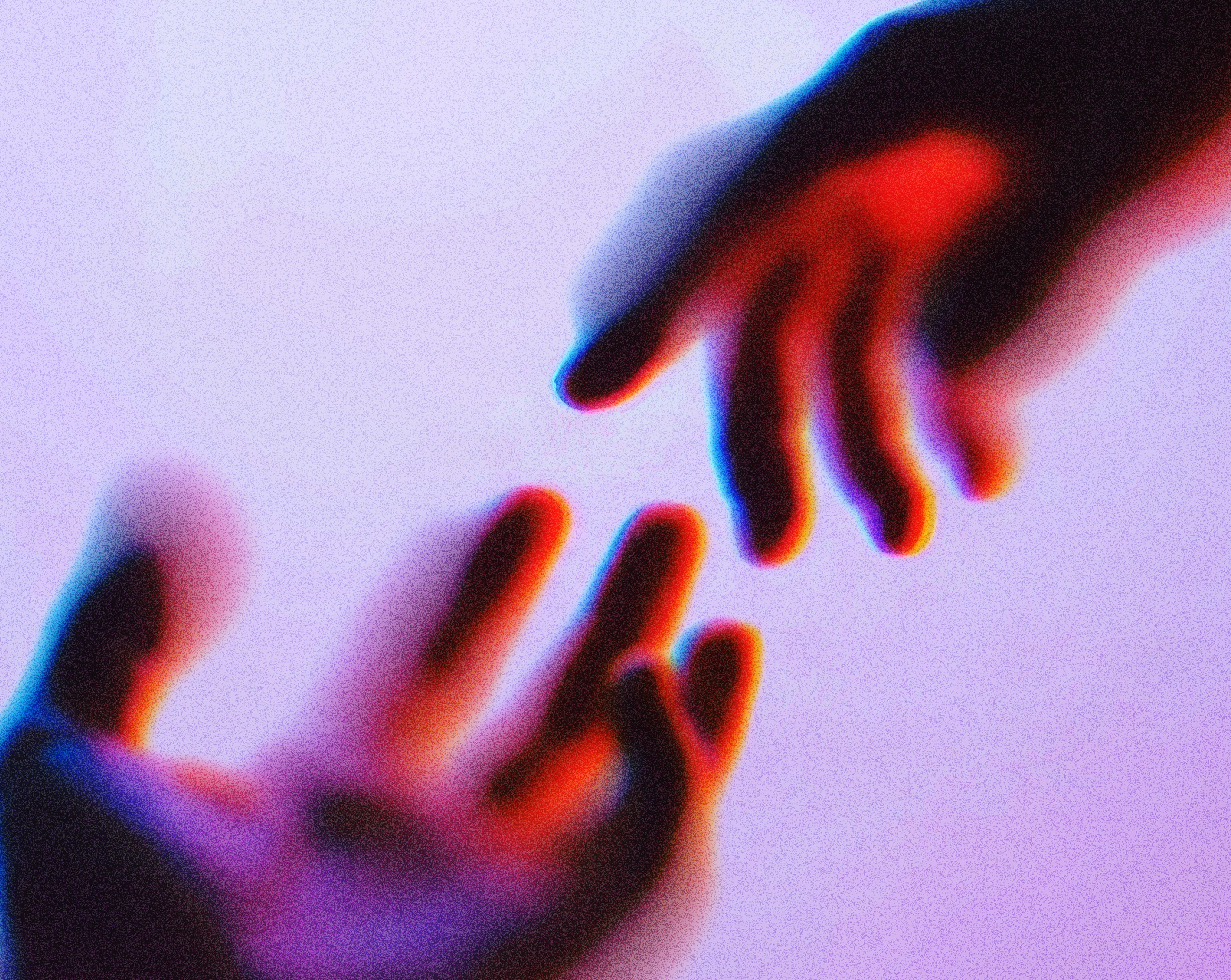 Abstract image of two hands reaching toward each other