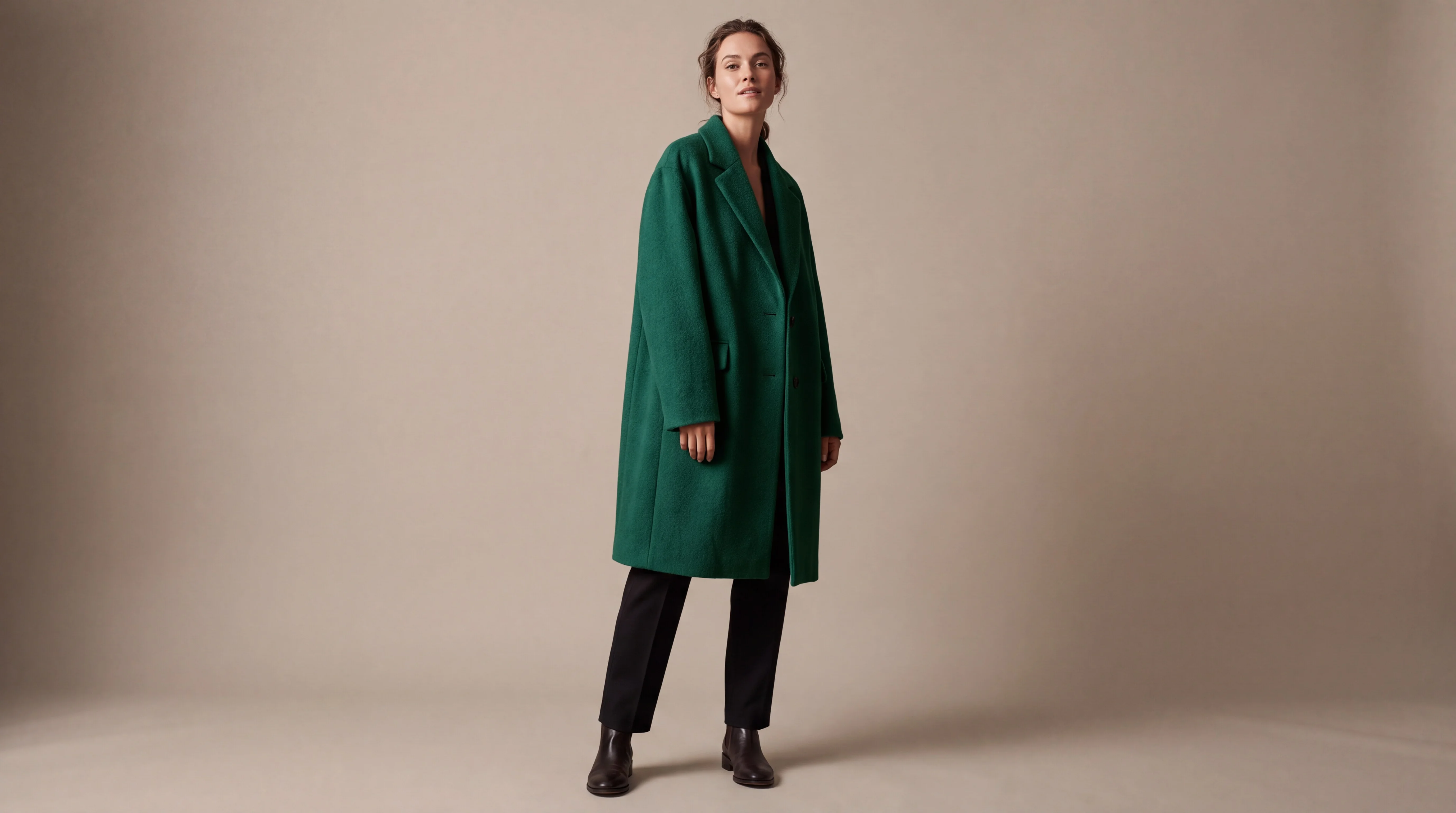 The same model with the overcoat changed to forest green