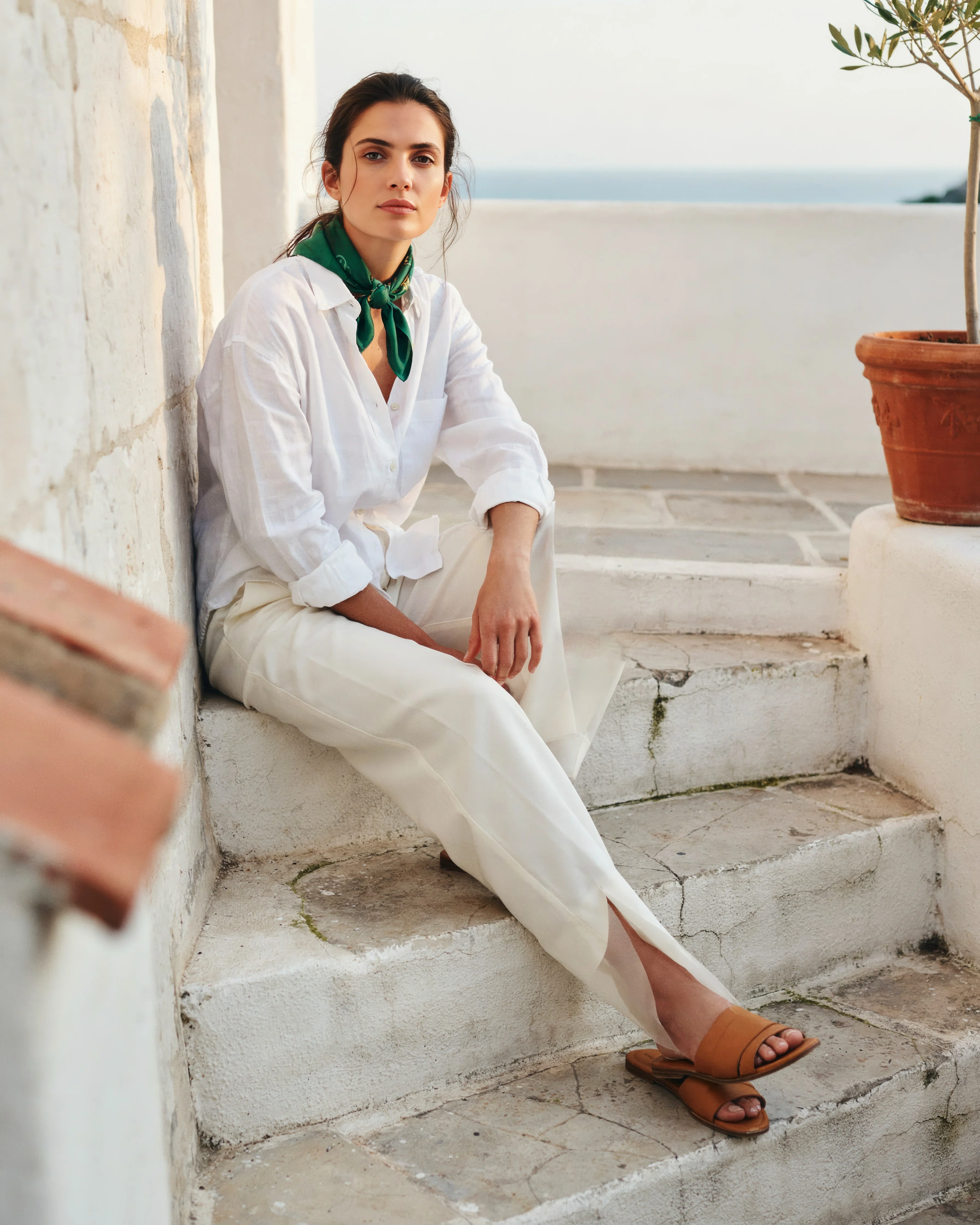 Change the green silk scarf to navy polka dots: the photo before the edit