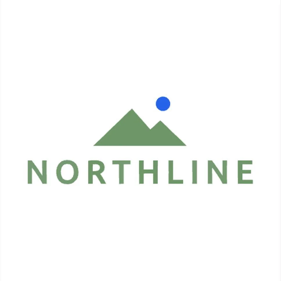 The same NORTHLINE logo with the sun recolored blue. The mountains and lettering are still green.