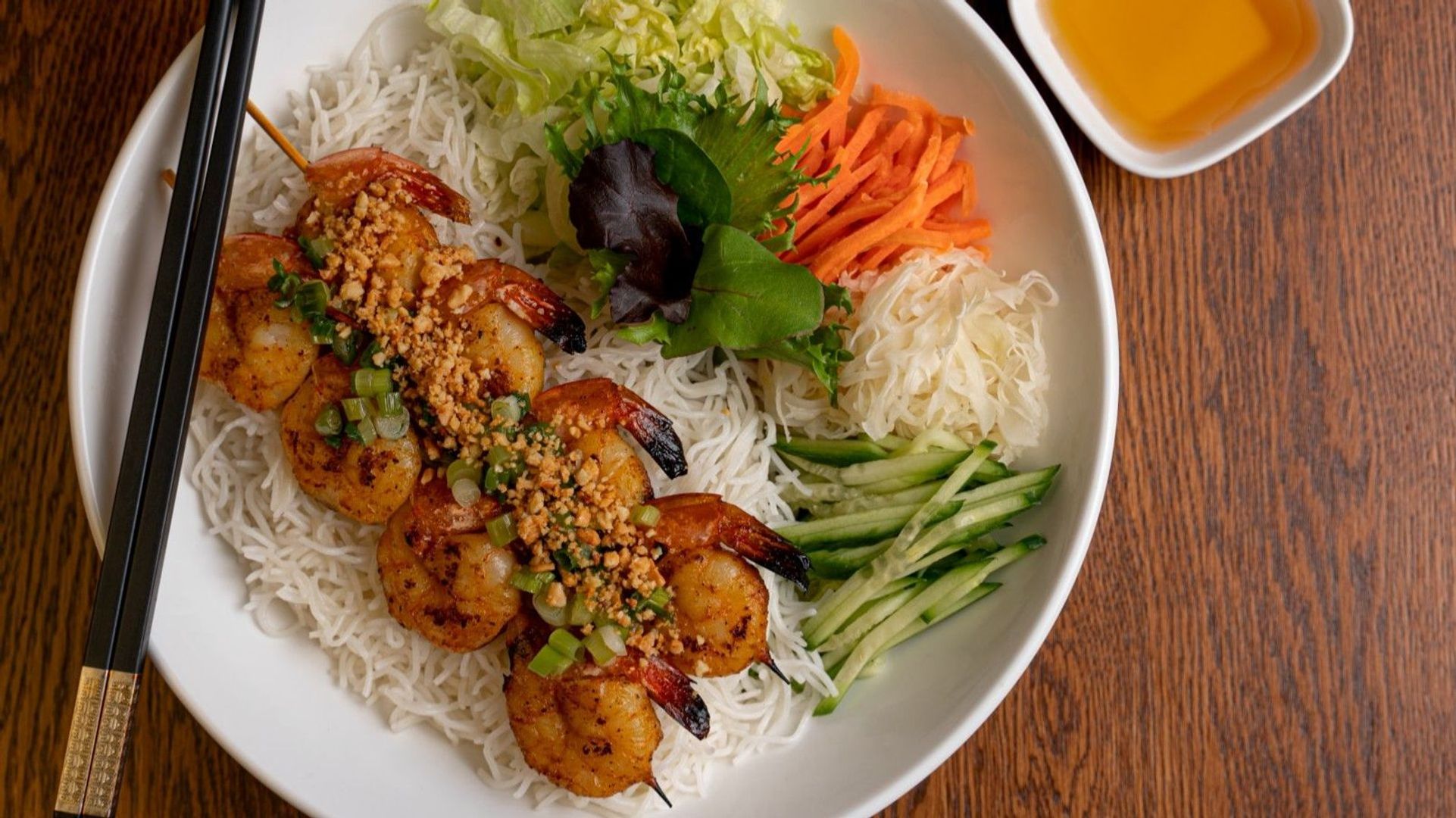 Vermicelli bowl with grilled shrimp skewers