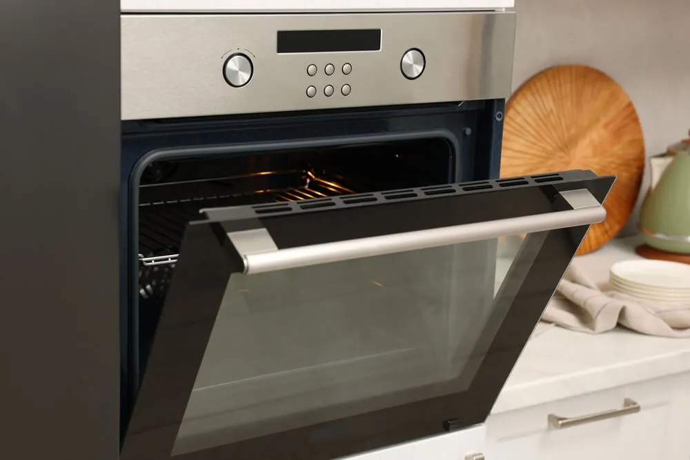 Experienced professionals from Mike's Appliance Service is performing a repair in Greensboro near Oak Ridge.
