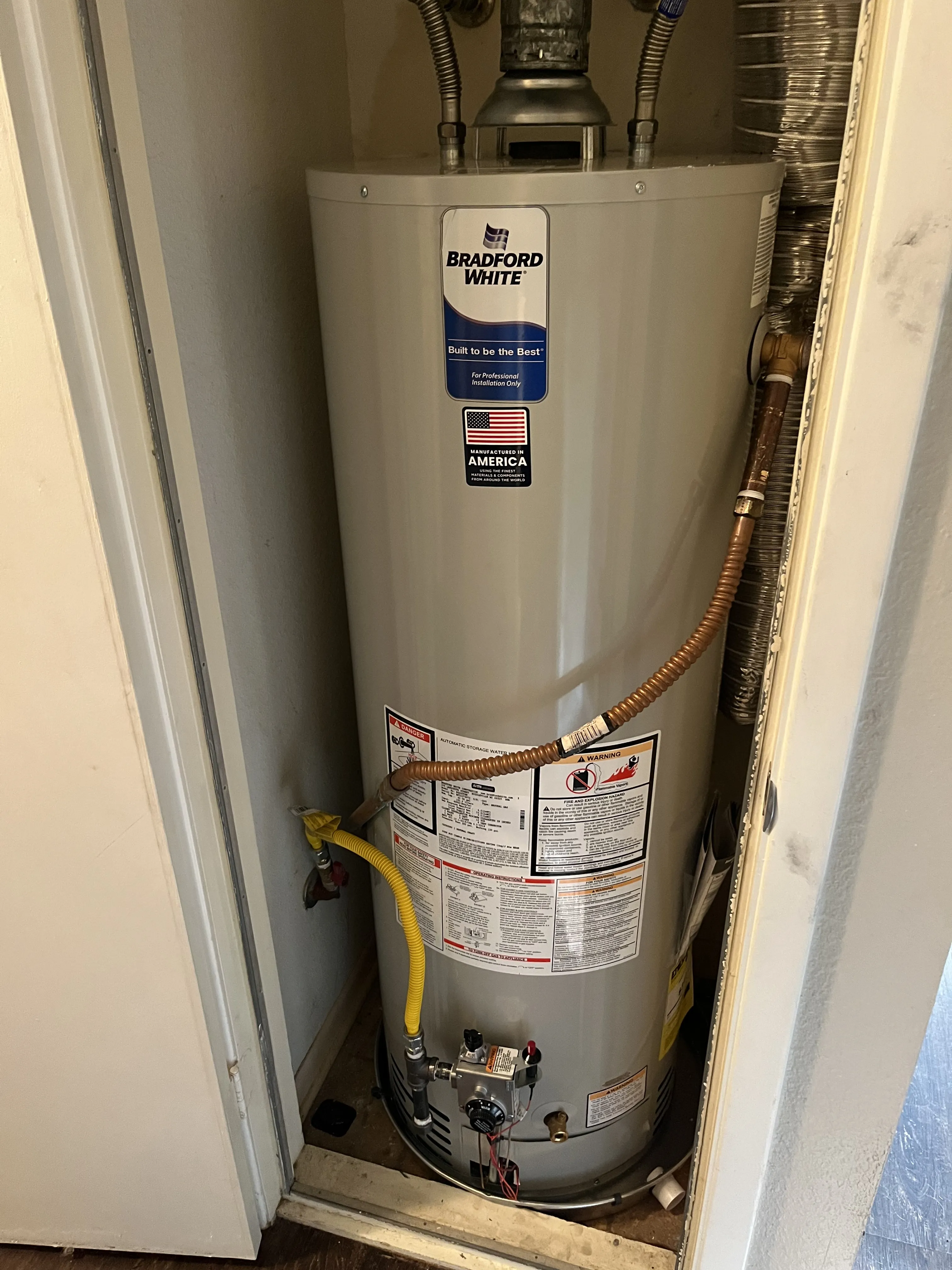 Content homeowner with efficient water heater installation by Weekend Water Heater in Austin, TX