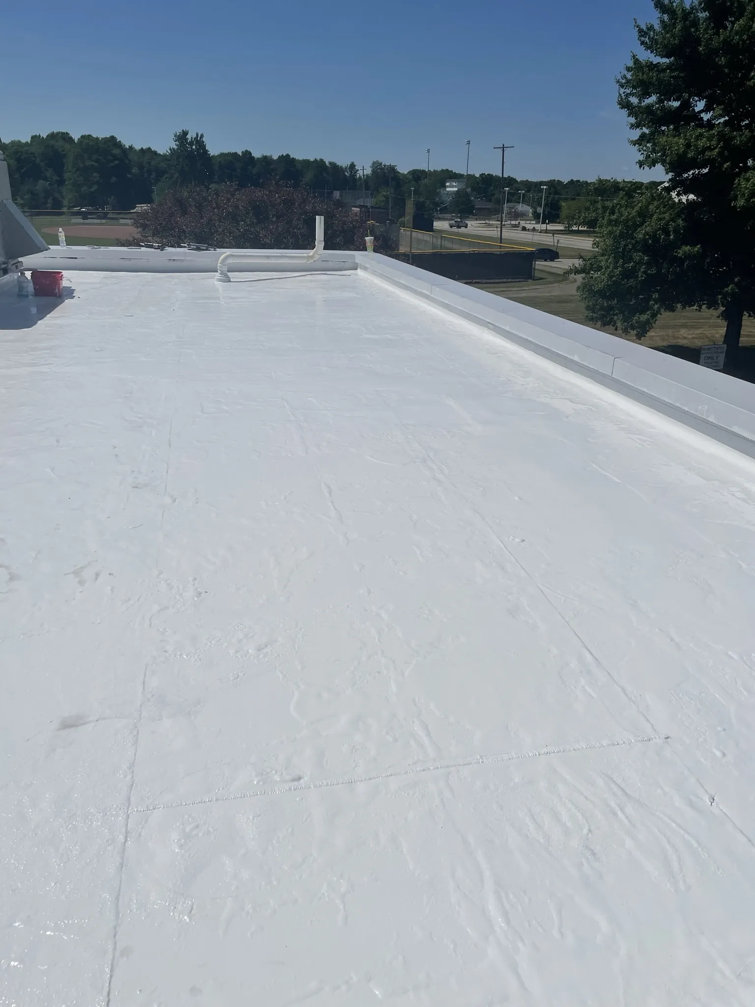 Acrylic roof coating services offered by Bill Jackson Roofing, Inc.