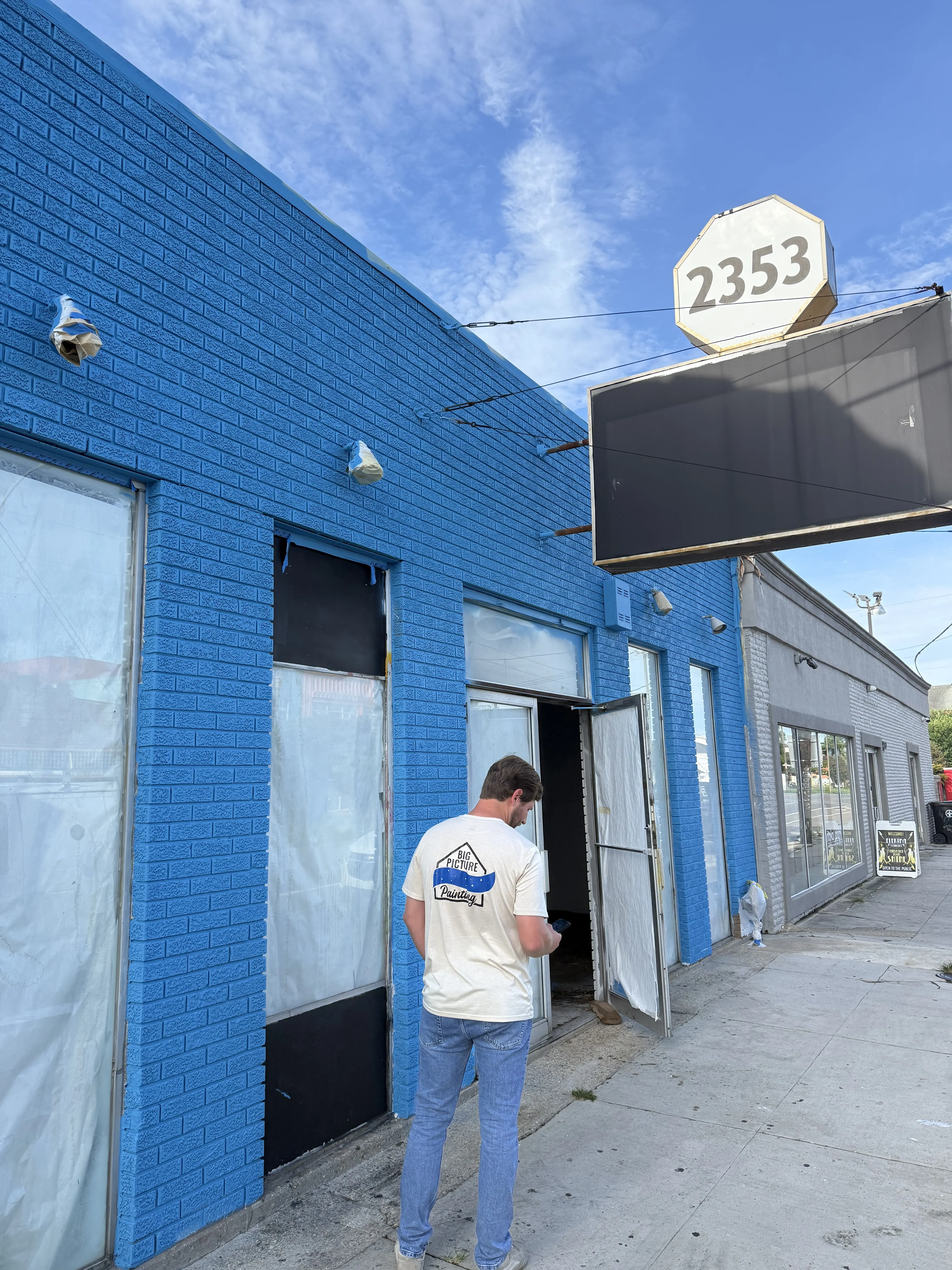 Skilled Big Picture Painting team working on an interior wall in New Orleans, LA