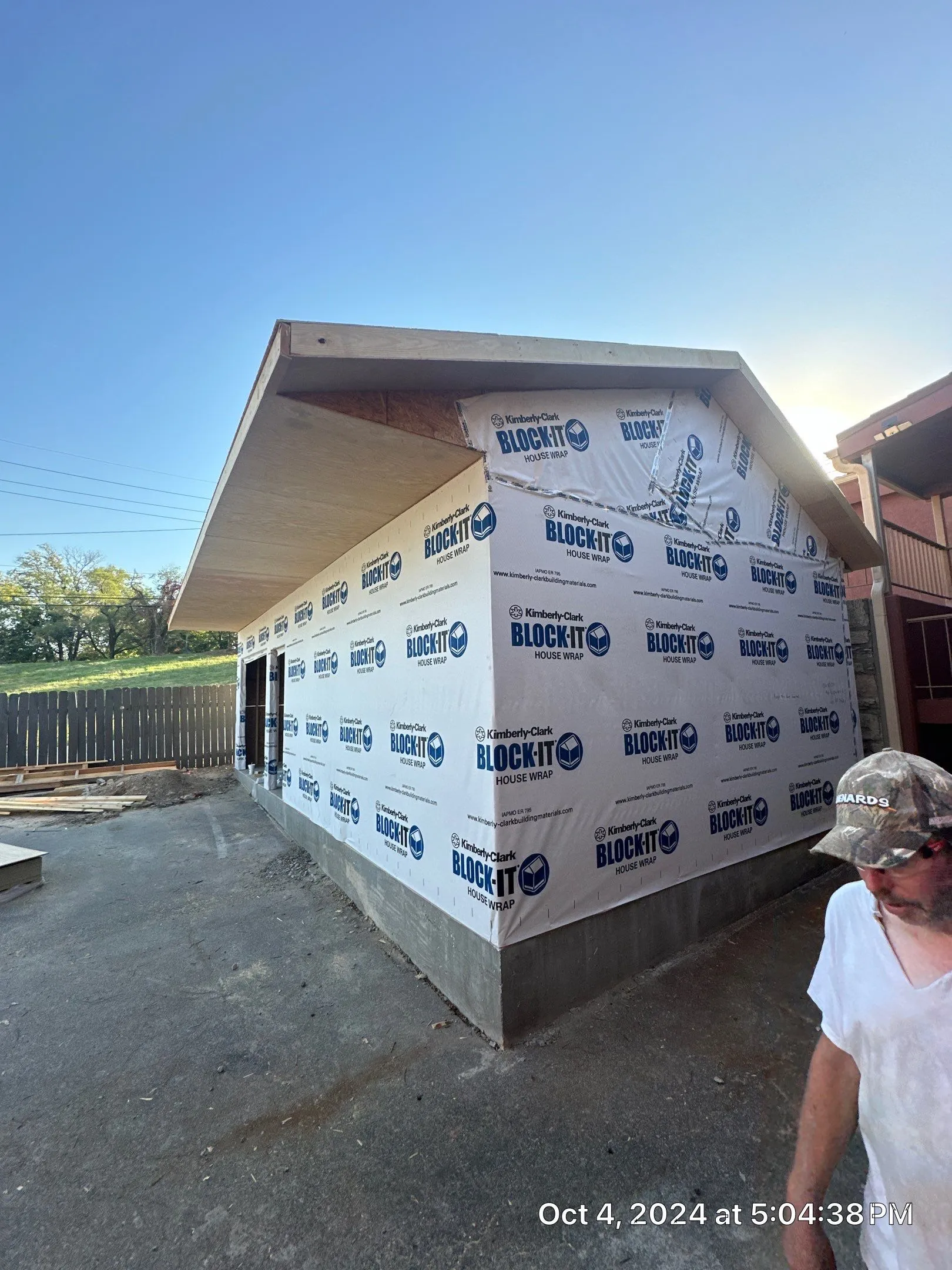 A home’s exterior being restored with new siding installation, and major repairs, in Kansas, mo home and surrounding communities