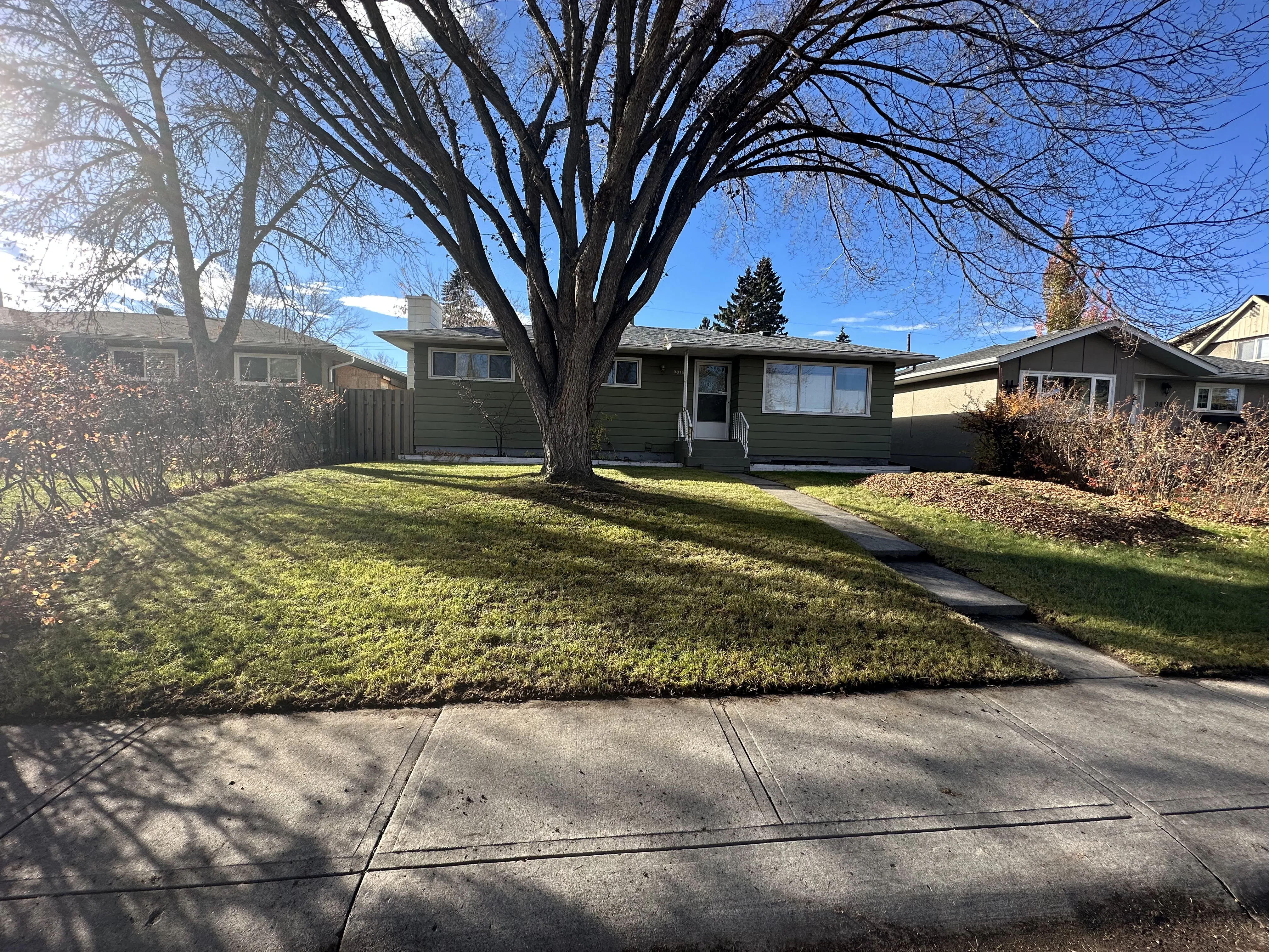 Regular maintenance including landscape services and hardscaping services for dream outdoor space and green lawn in Calgary, AB.