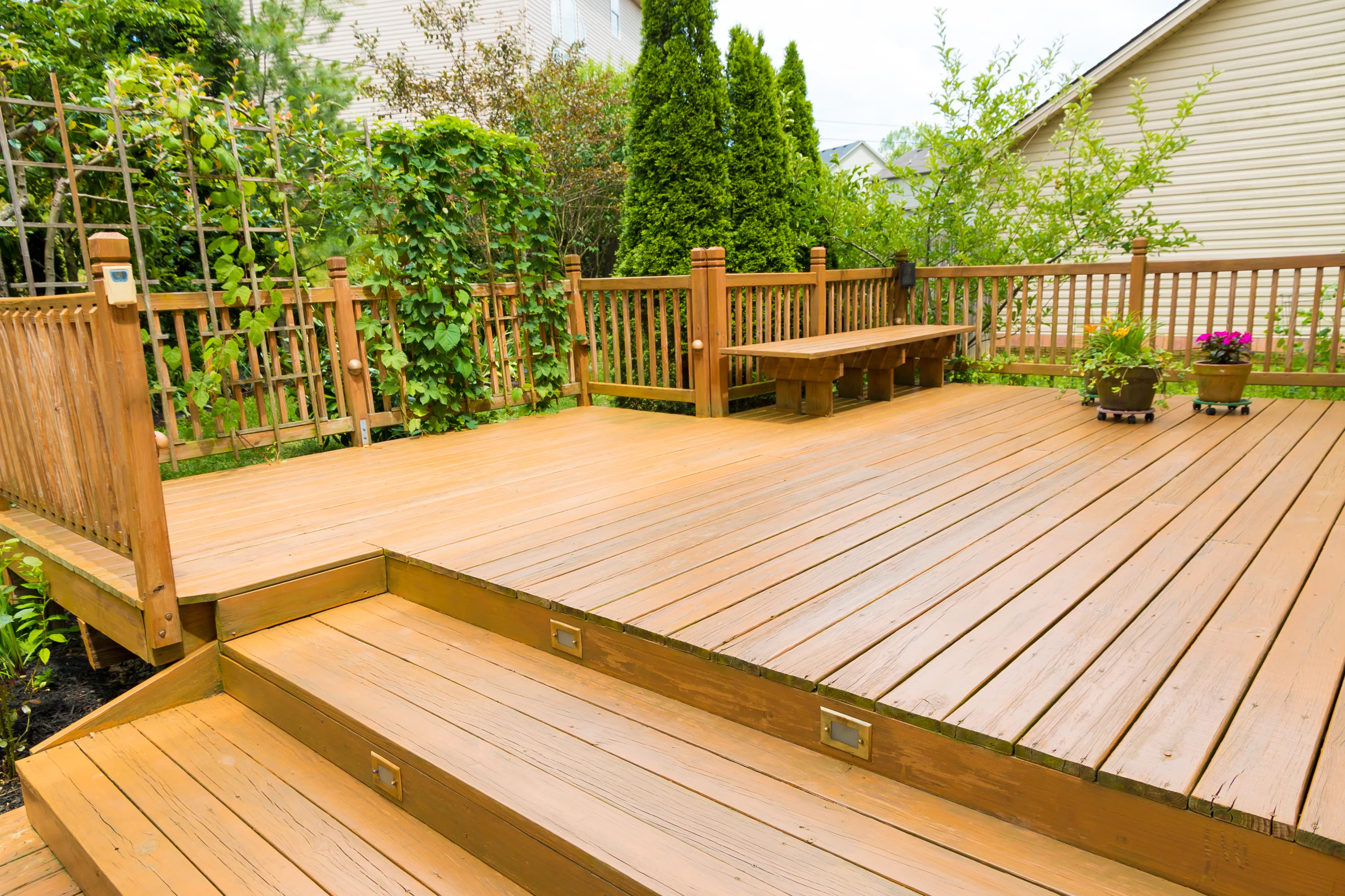 Wood siding and deck being professionally reconditioned in Columbus