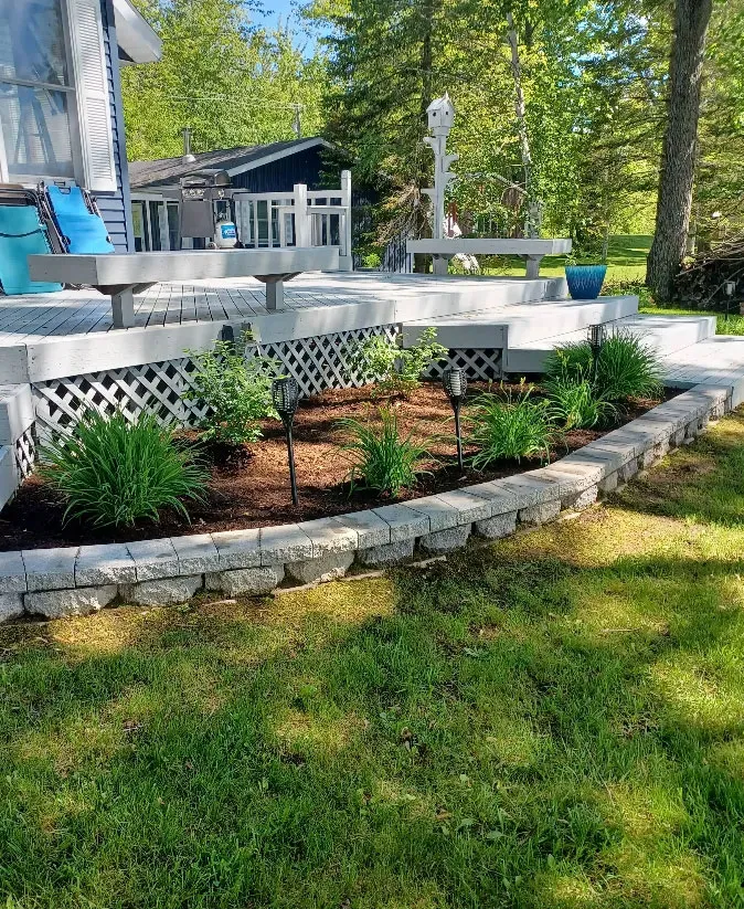 Hardscaping built around plant bed in Indian River.