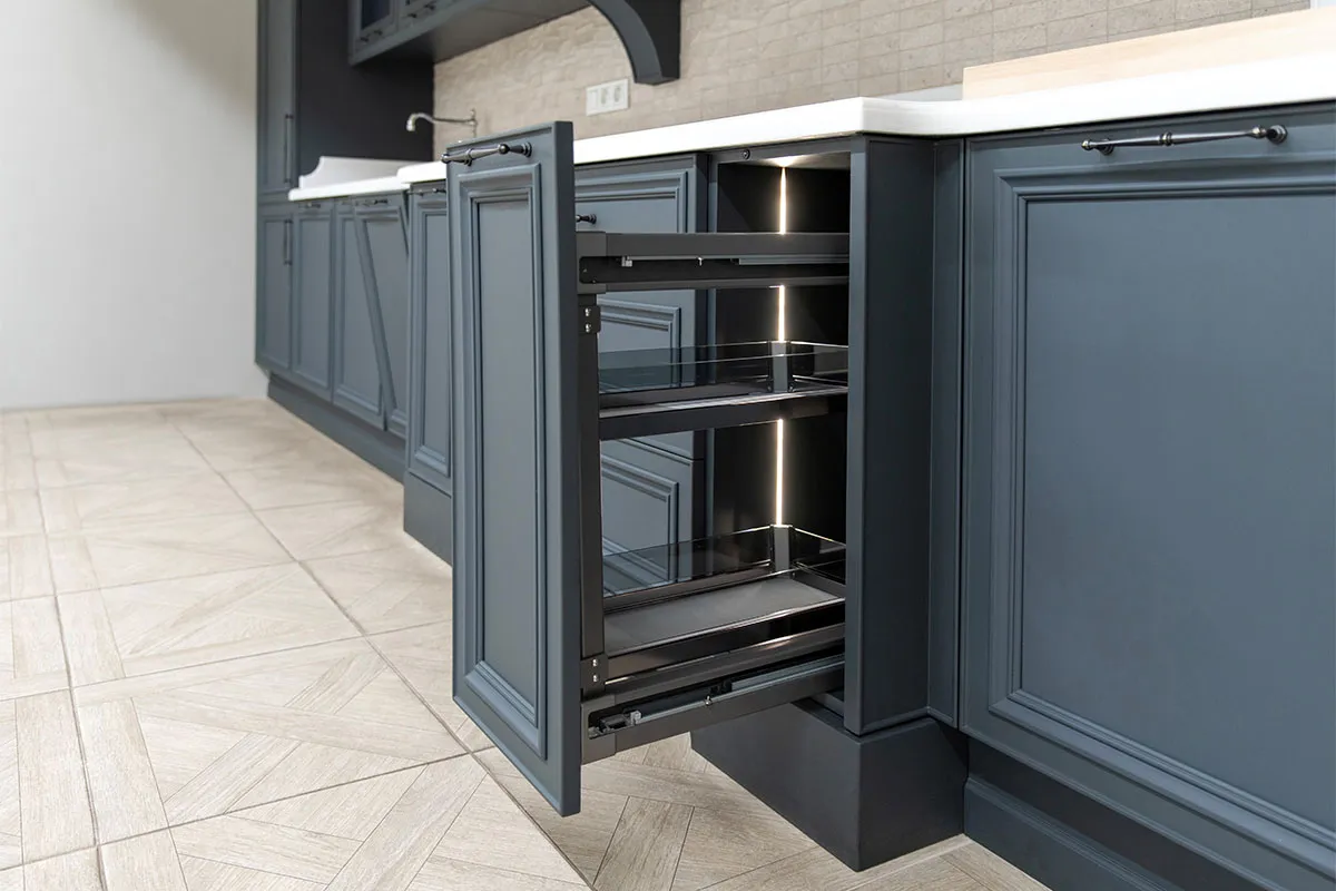 An example of custom cabinetry with a cabinet that slides out.