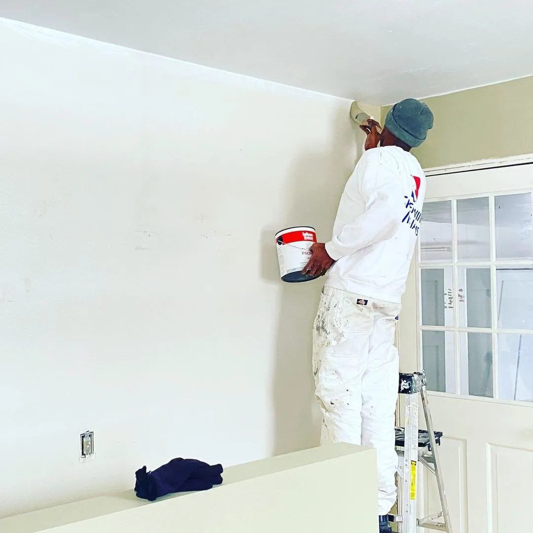 A living room showcasing great job painting with professional interior painting services, reflecting top notch expertise in the painting industry and commercial projects in the wi area.