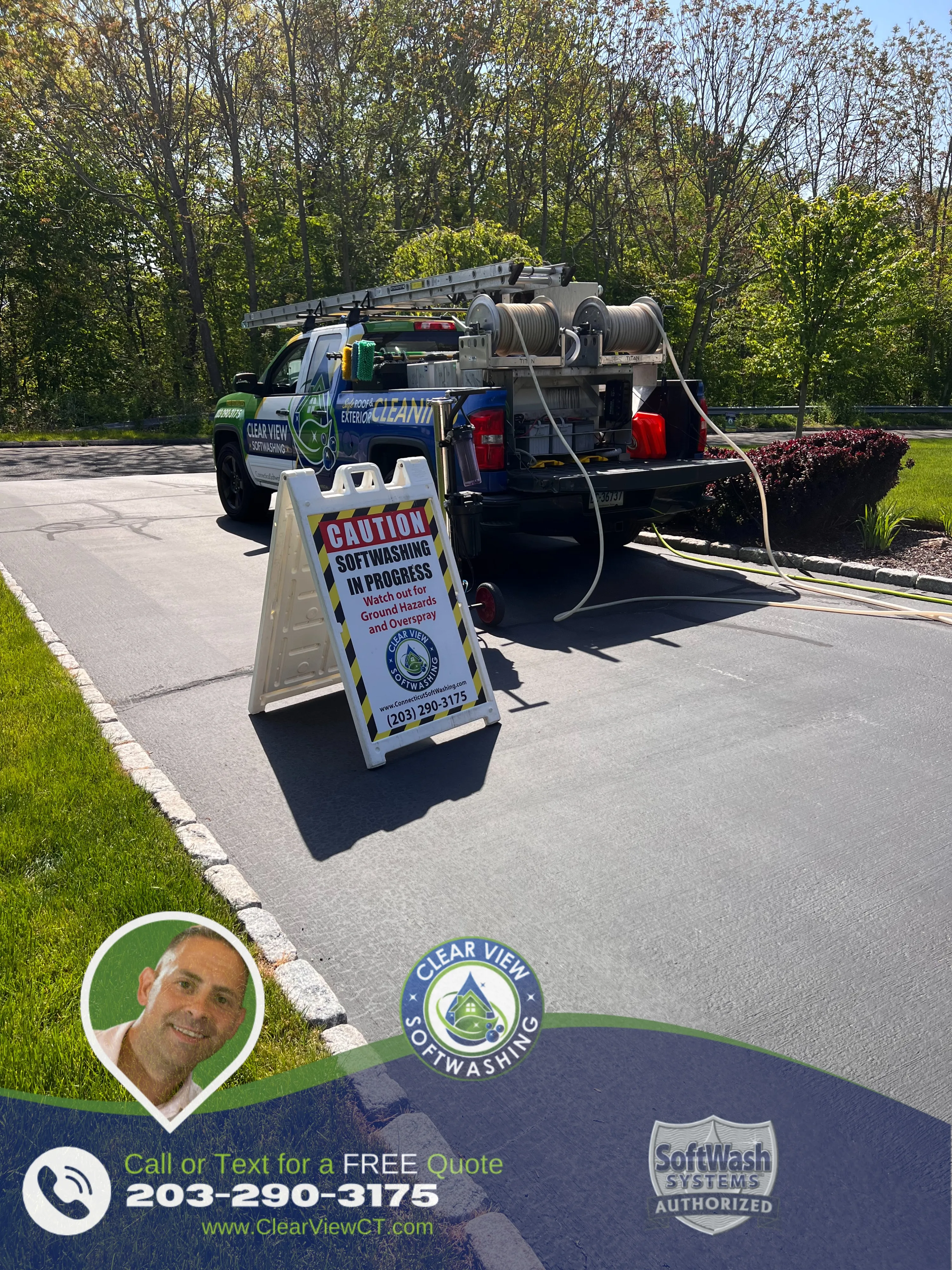 A team softwashing a home exterior in Bridgeport, CT with eco-friendly solutions.