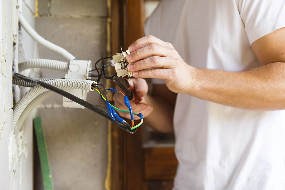 Professional performing electrical services in New Hampshire.