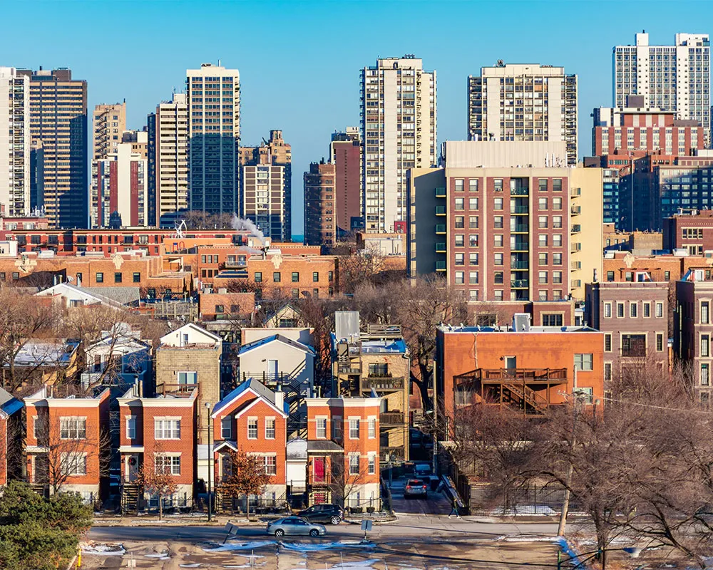 Chicago homes with a skyline behind.