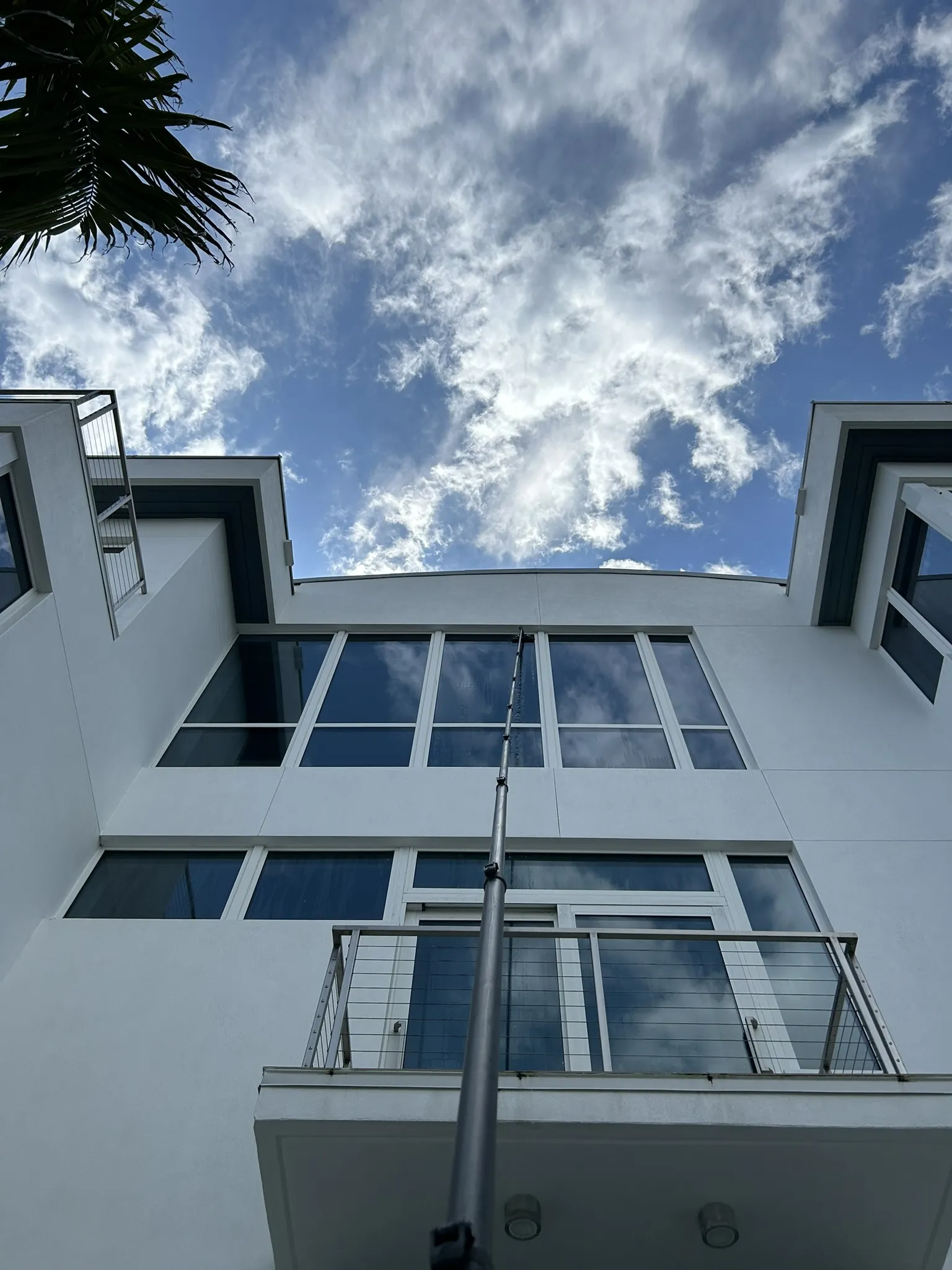 Expert residential window cleaning service technician doing a  fabulous job making windows sparkle and window sills sparkle