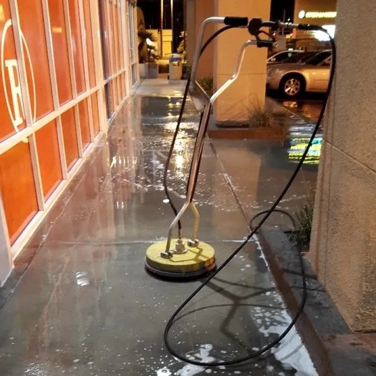 Professional pressure washing of the commercial building,