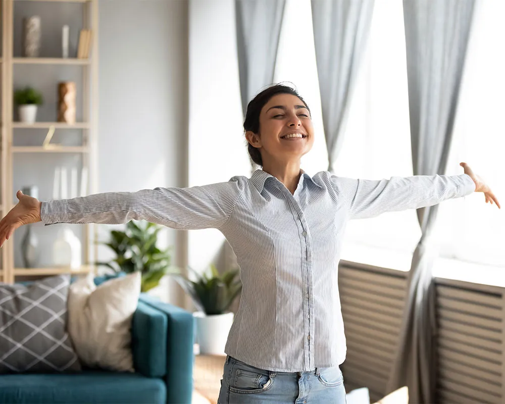 A person breathing clean air in their home.