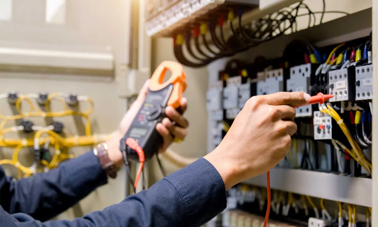 Electrician testing the sockets