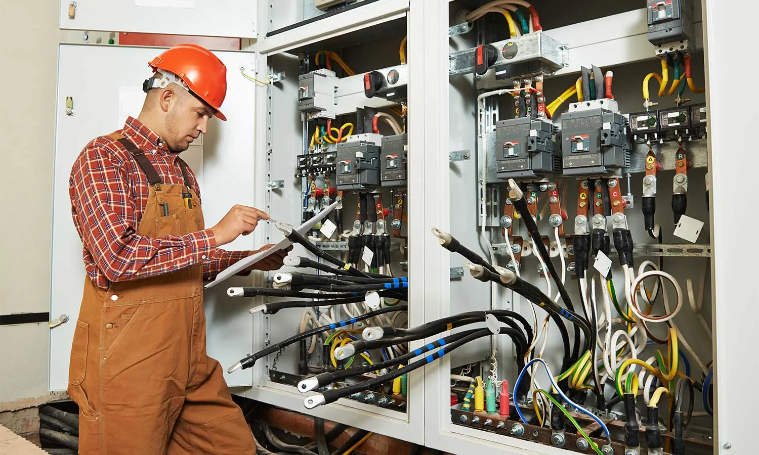 Reliable electrician working in the industries