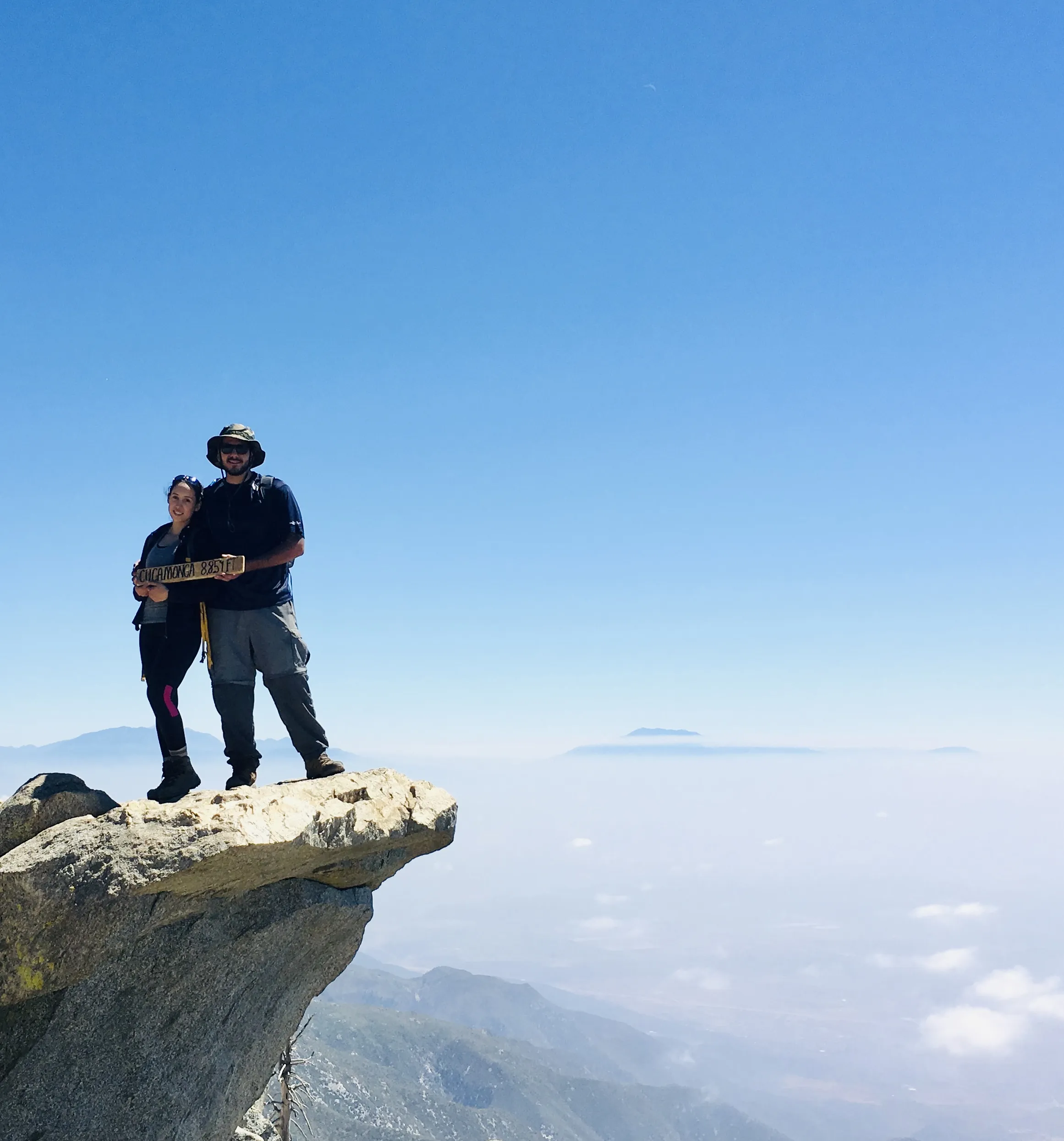 The owner standing proudly on the mountain