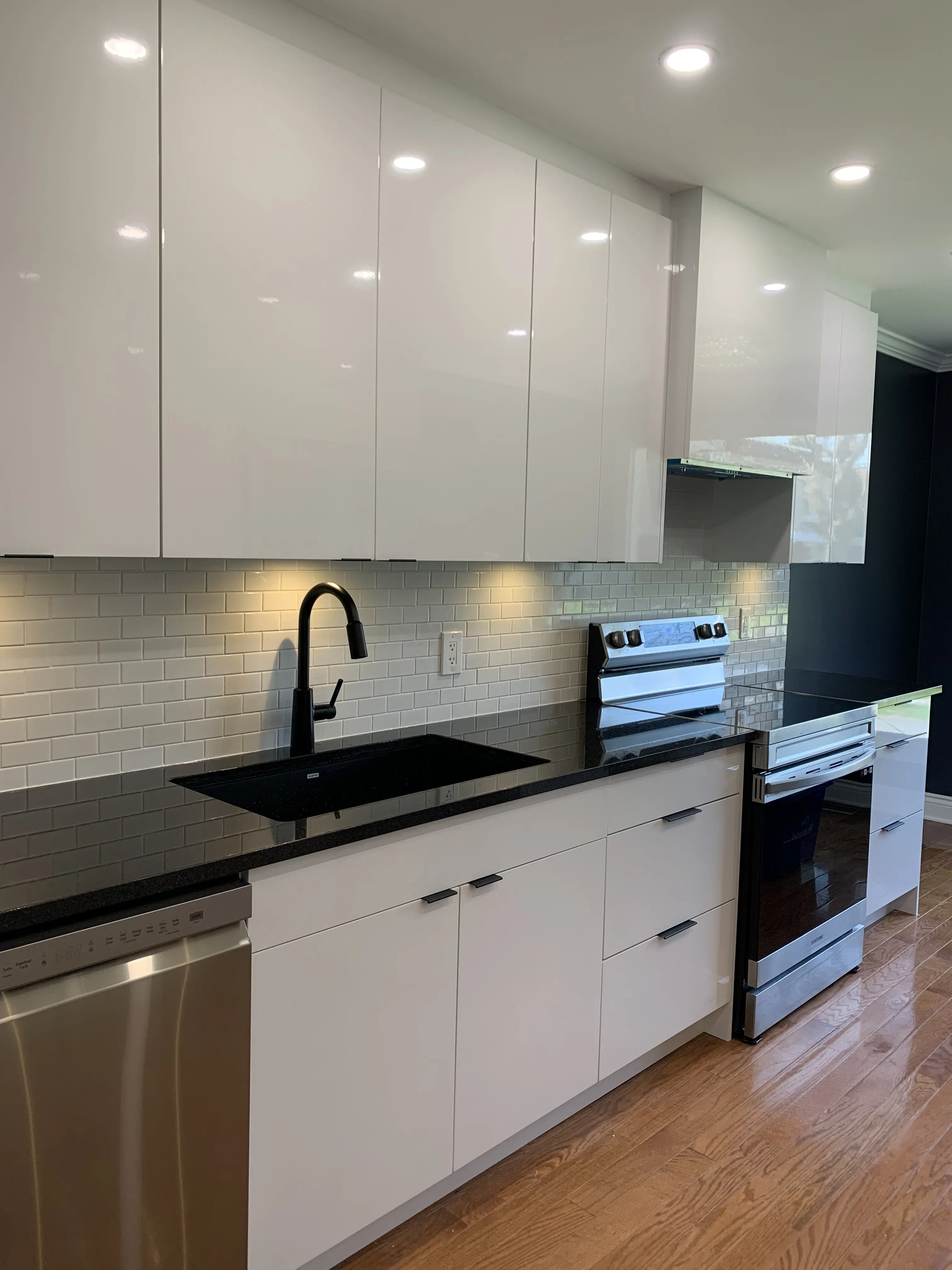 A bathroom contractor completing a small bathroom remodel with a shower combination, replacing an old tub and adding final touches to create a beautiful bathroom, showing the entire process from start to finish.