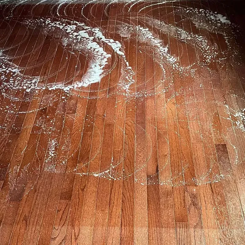 Hardwood floor with visible wax build-up in Fairfax, VA