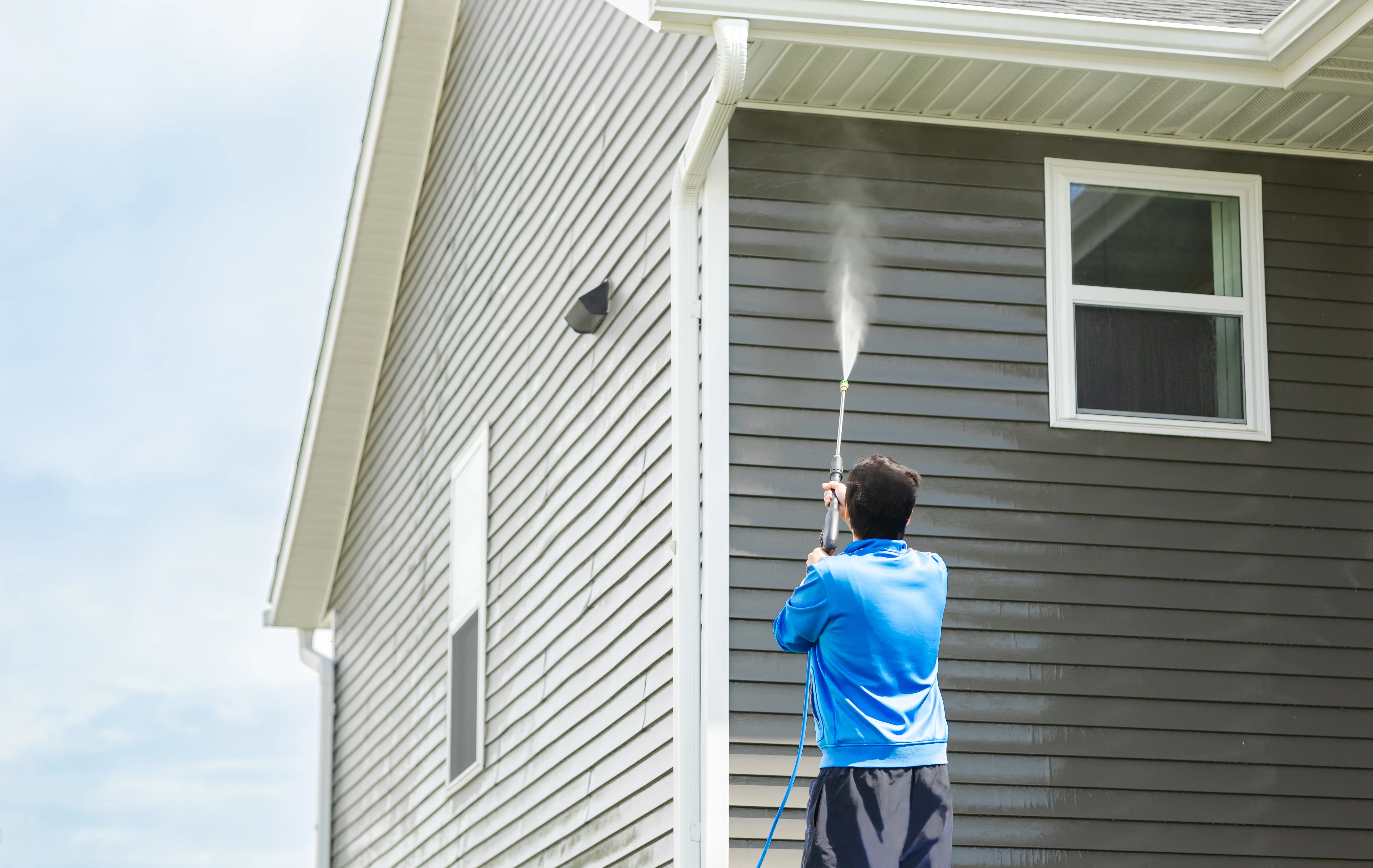 Professional soft washing house exterior in Edmonton.