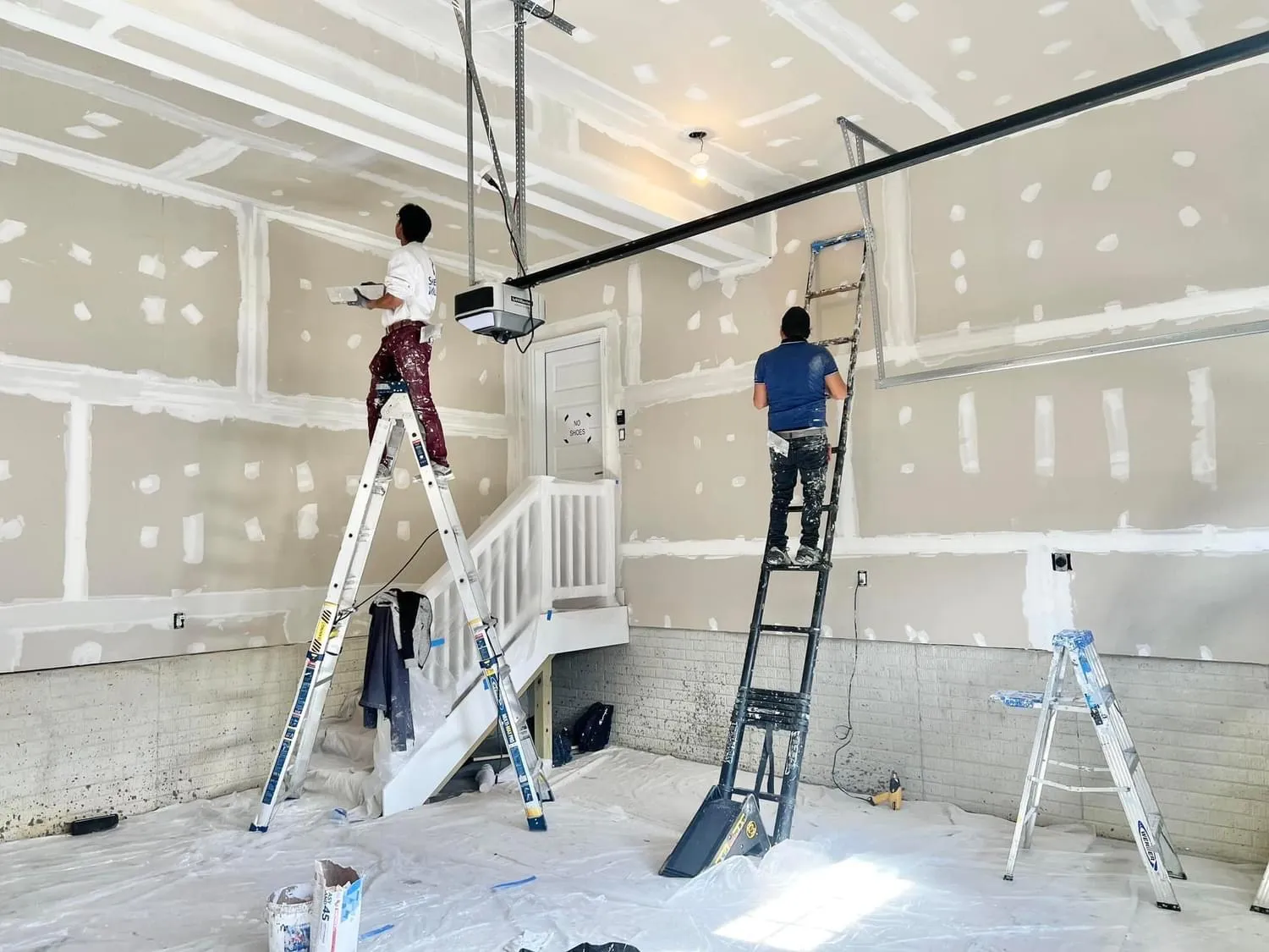 The professional team of Perfect Painters & More, Inc., equipped with top-grade brushes and paints, ready to elevate Maryland homes with their signature touch.