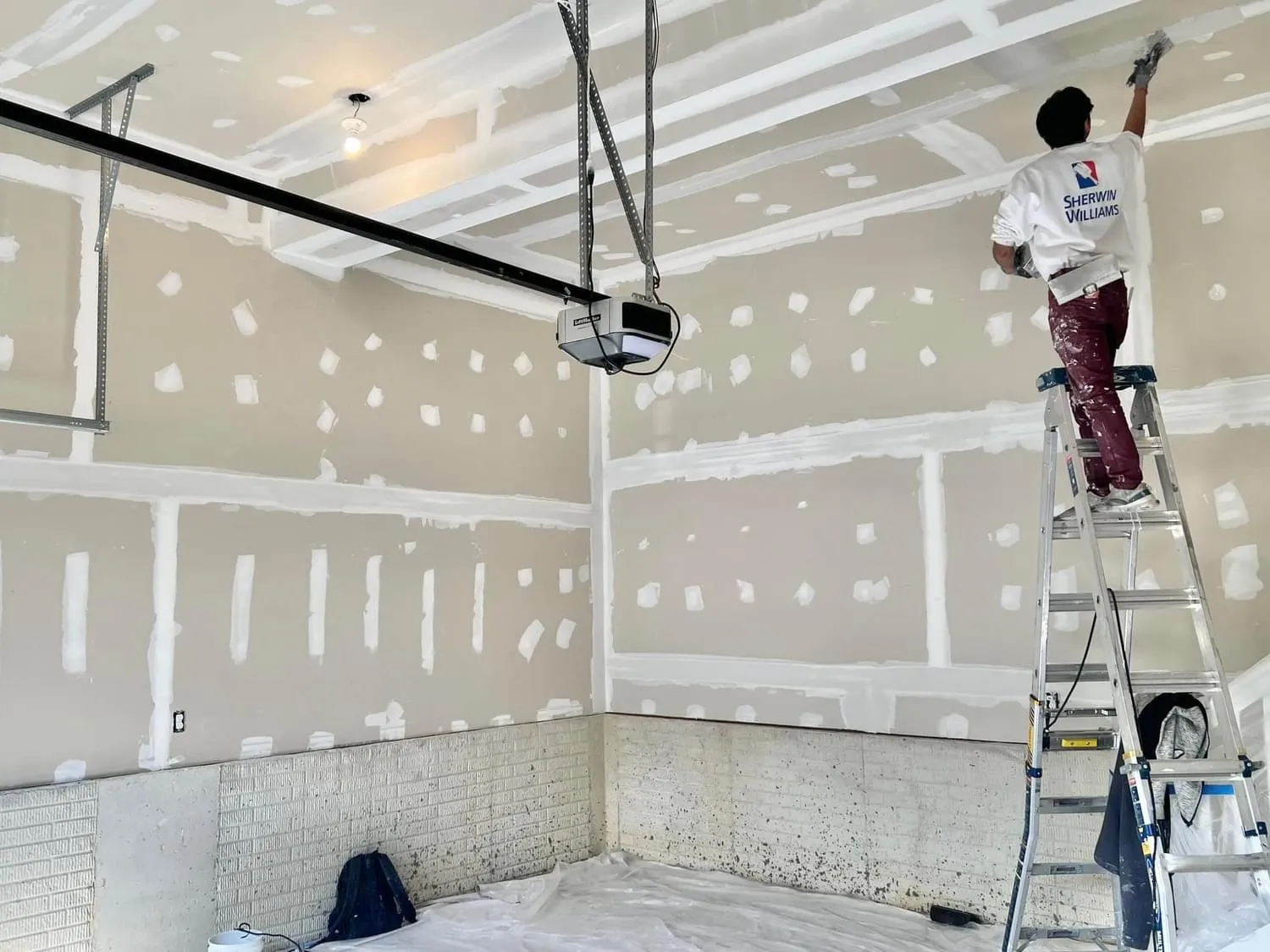 The professional team of Perfect Painters & More, Inc., equipped with top-grade brushes and paints, ready to elevate Maryland homes with their signature touch.