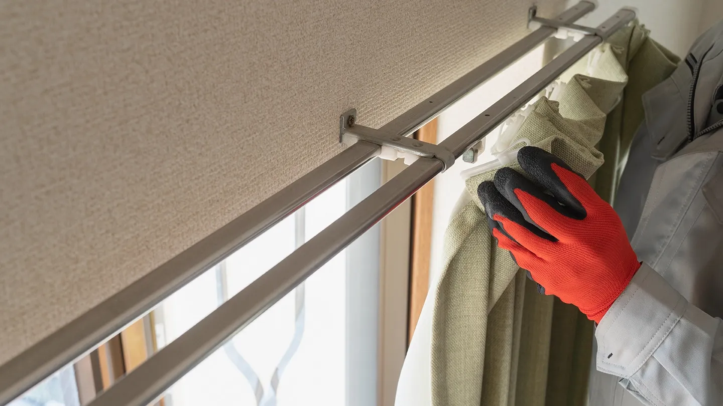 Professional move-out cleaning in Austin apartment, with cleaner curtains.