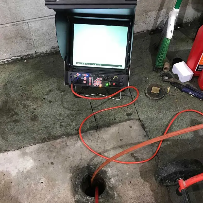Camera inspection of pipe walls in Northern Virginia showing real-time video feed to detect blockages, cracks, and buildup inside underground pipes.