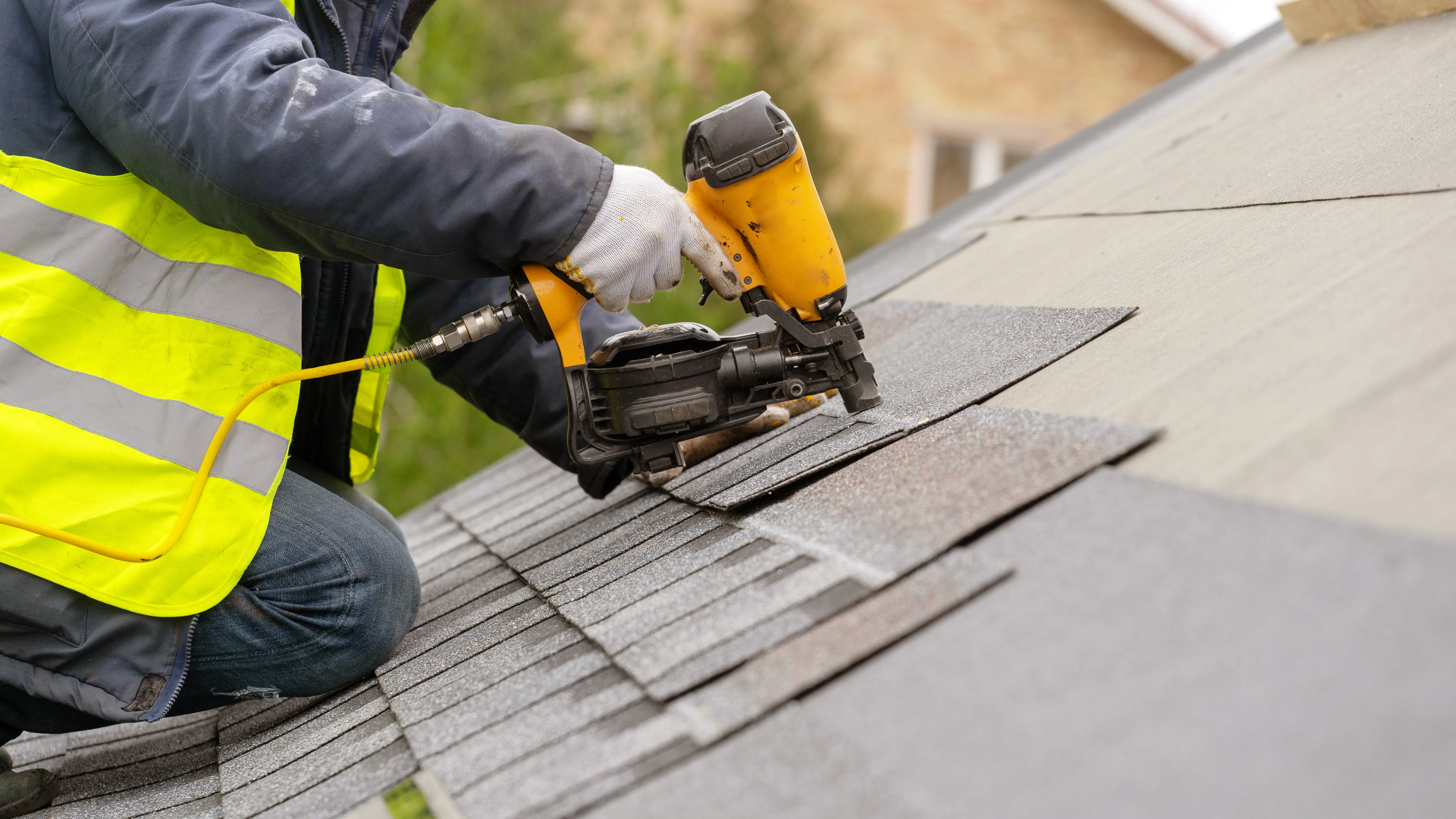 Professional repairing the roof.