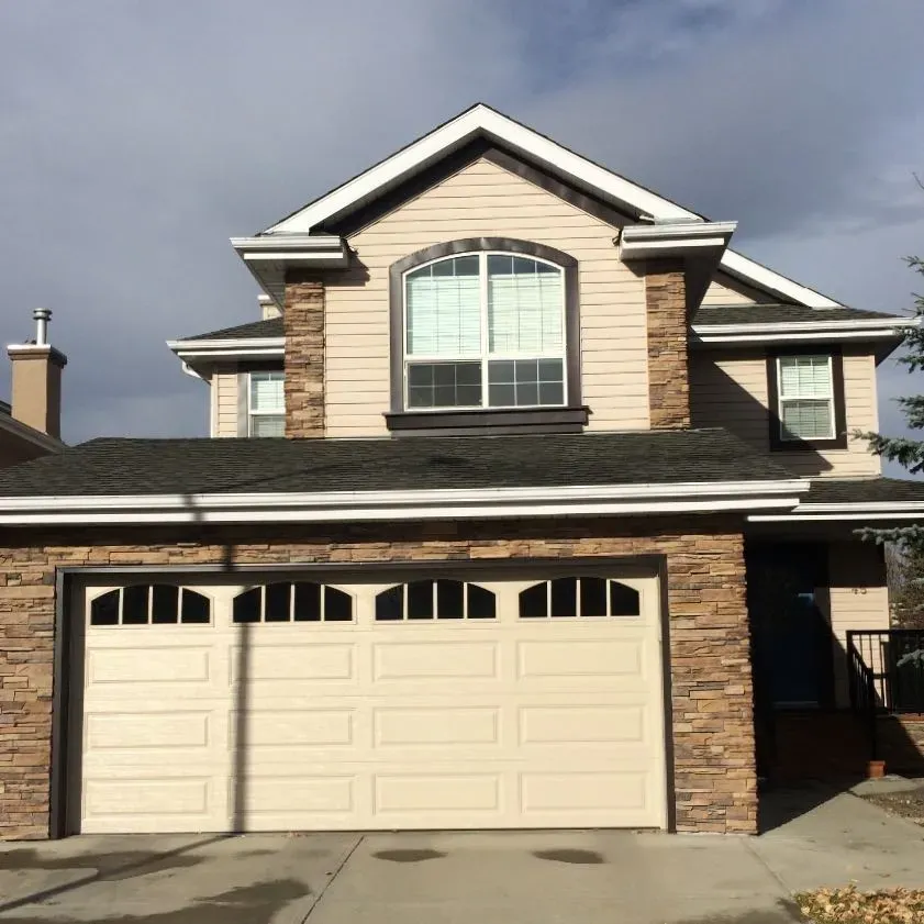 Clean windows at a home in Calgary.