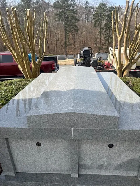 Clean cemetery grounds, office, and lot maintained by power washer using high pressure water without too much pressure, ideal for property manager handling outdoor furniture and cleaning siding.