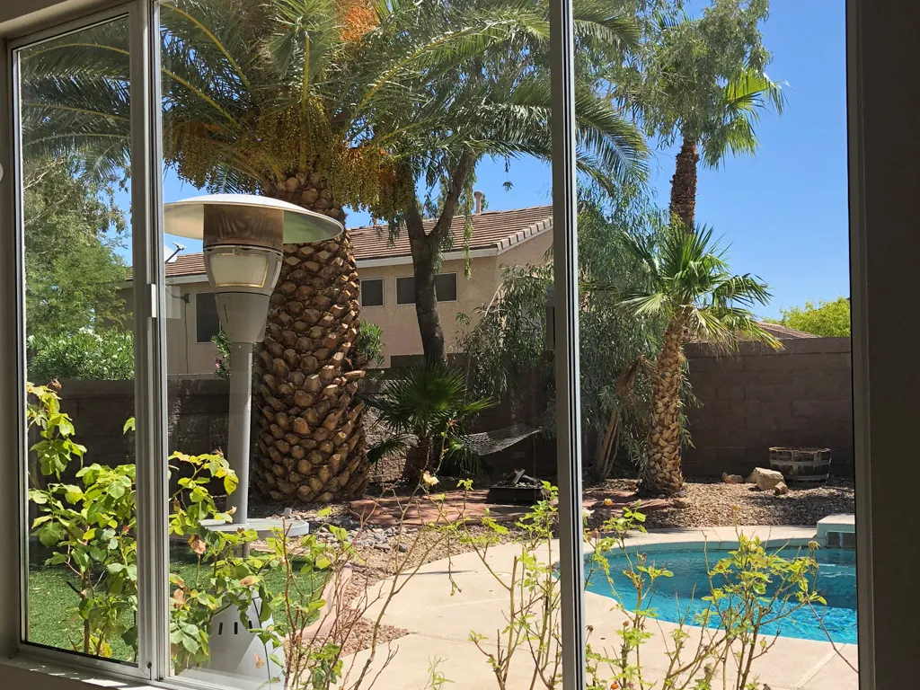 Wonderful job  ensuring customer satisfaction of residential window showing results of hard water stain removal in North Las Vegas, NV.