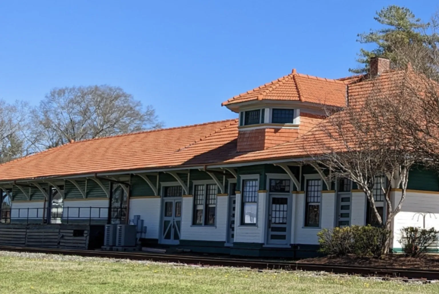 A professional washing company and skilled team are doing a fantastic job cleaning a roof in Athens, GA.