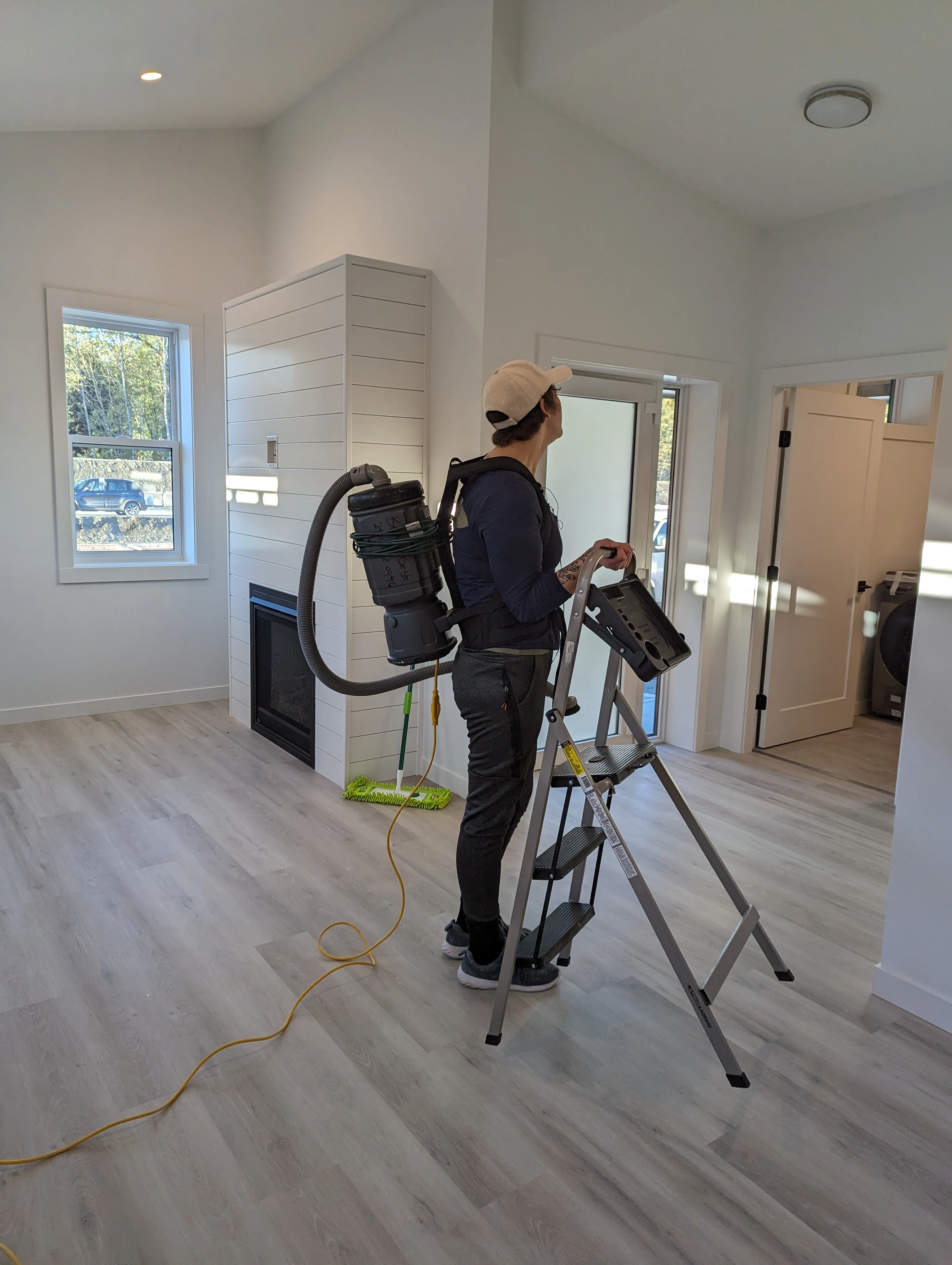 Cleaning the front entryway of a Comox Valley home.