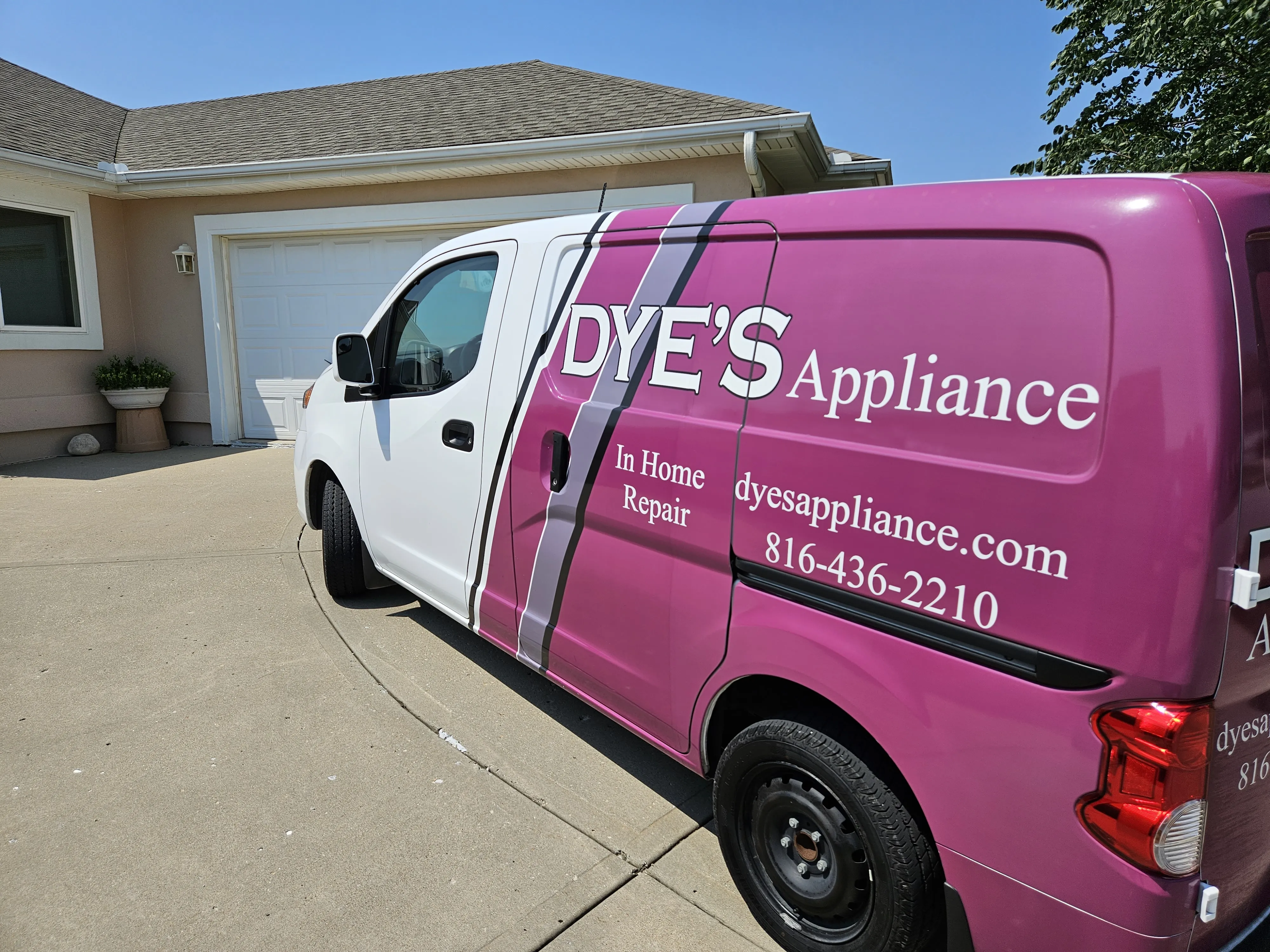 Expert Dye's Appliance technician repairing a major home appliance in a Kansas City home