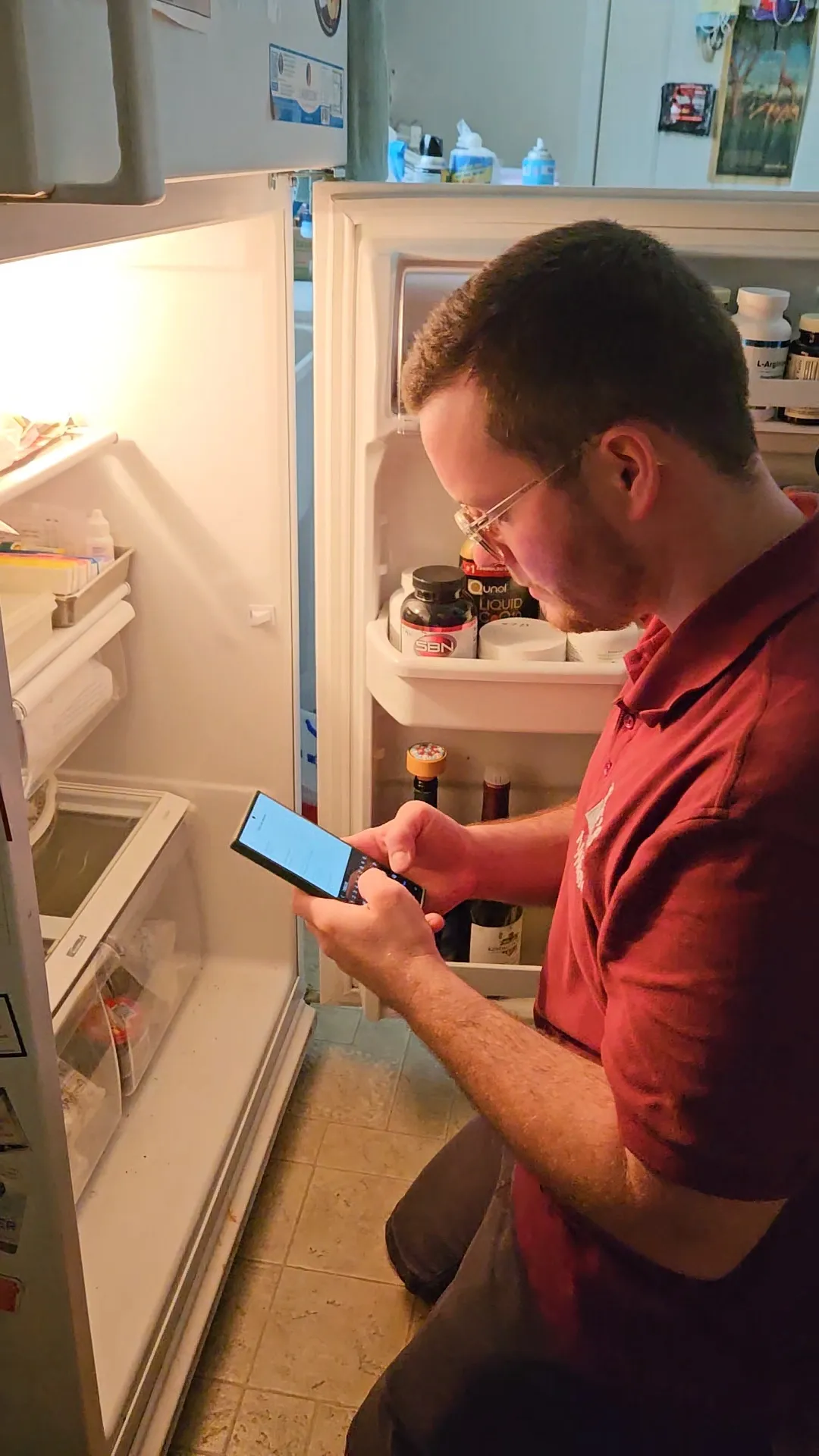 Expert technician repairing a refrigerator in Kansas City, Missouri