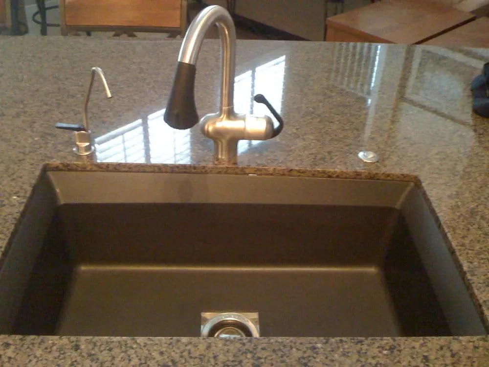 A well-functioning kitchen sink in a Phoenix home after receiving our kitchen plumbing services.