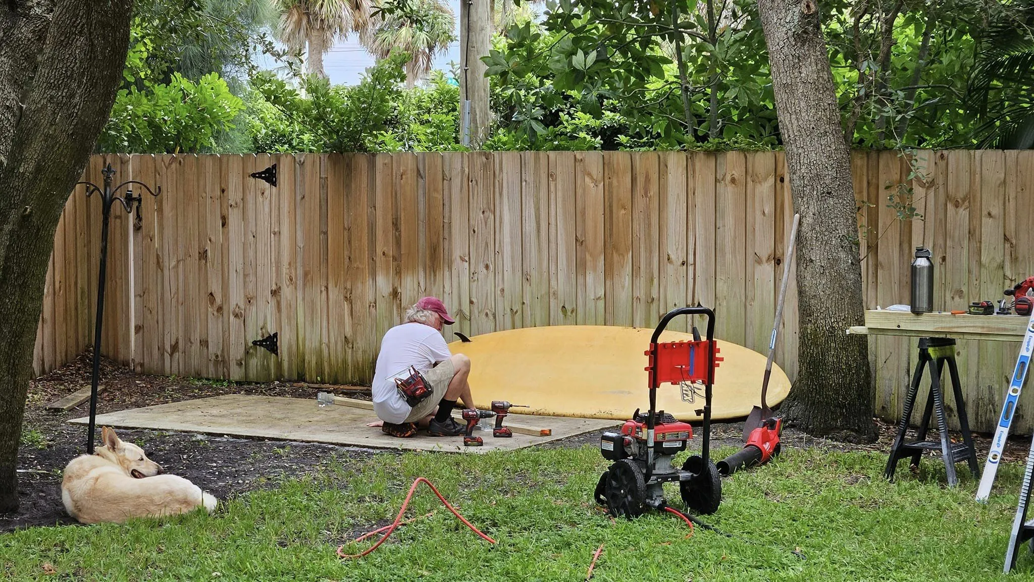 A skilled professional from Howe Handy Vero LLC building a surf board rack.