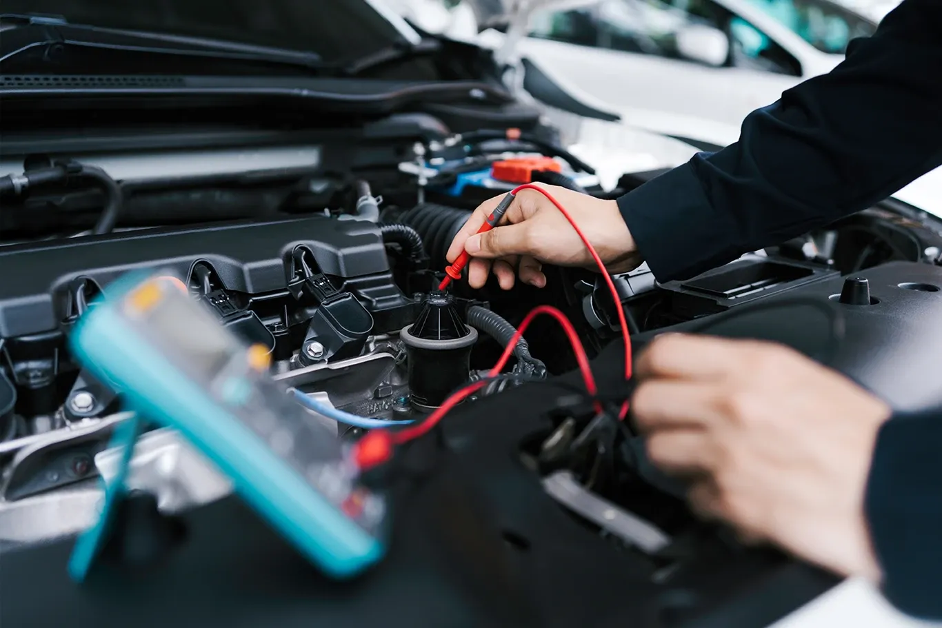 Mobile auto technician performing electrical diagnostics on a car in Humble, TX. Ase certified in lake houston.