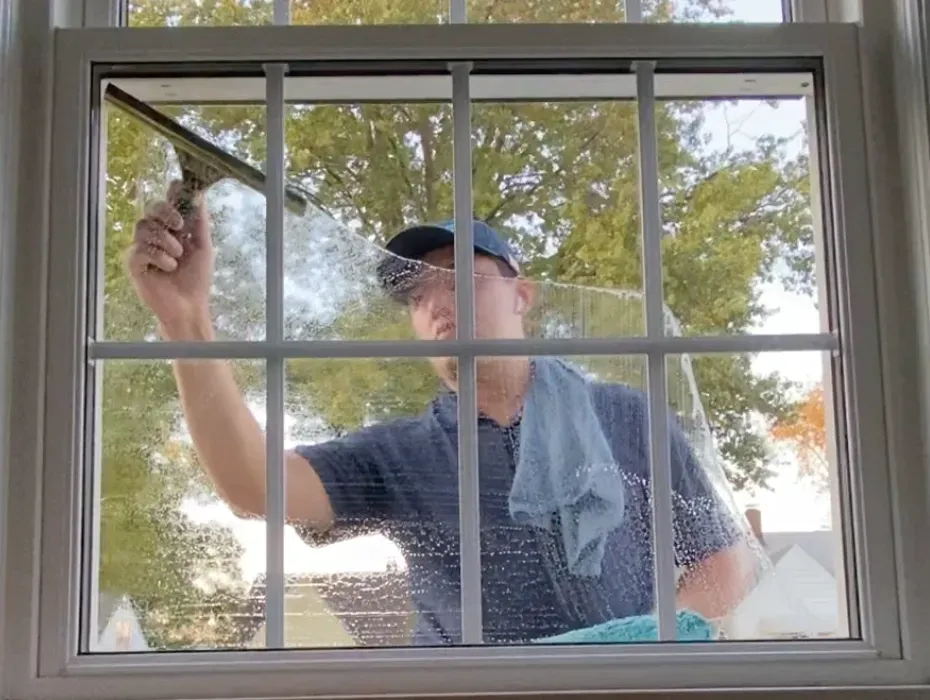The Tristar team diligently cleaning windows in Peoria, IL