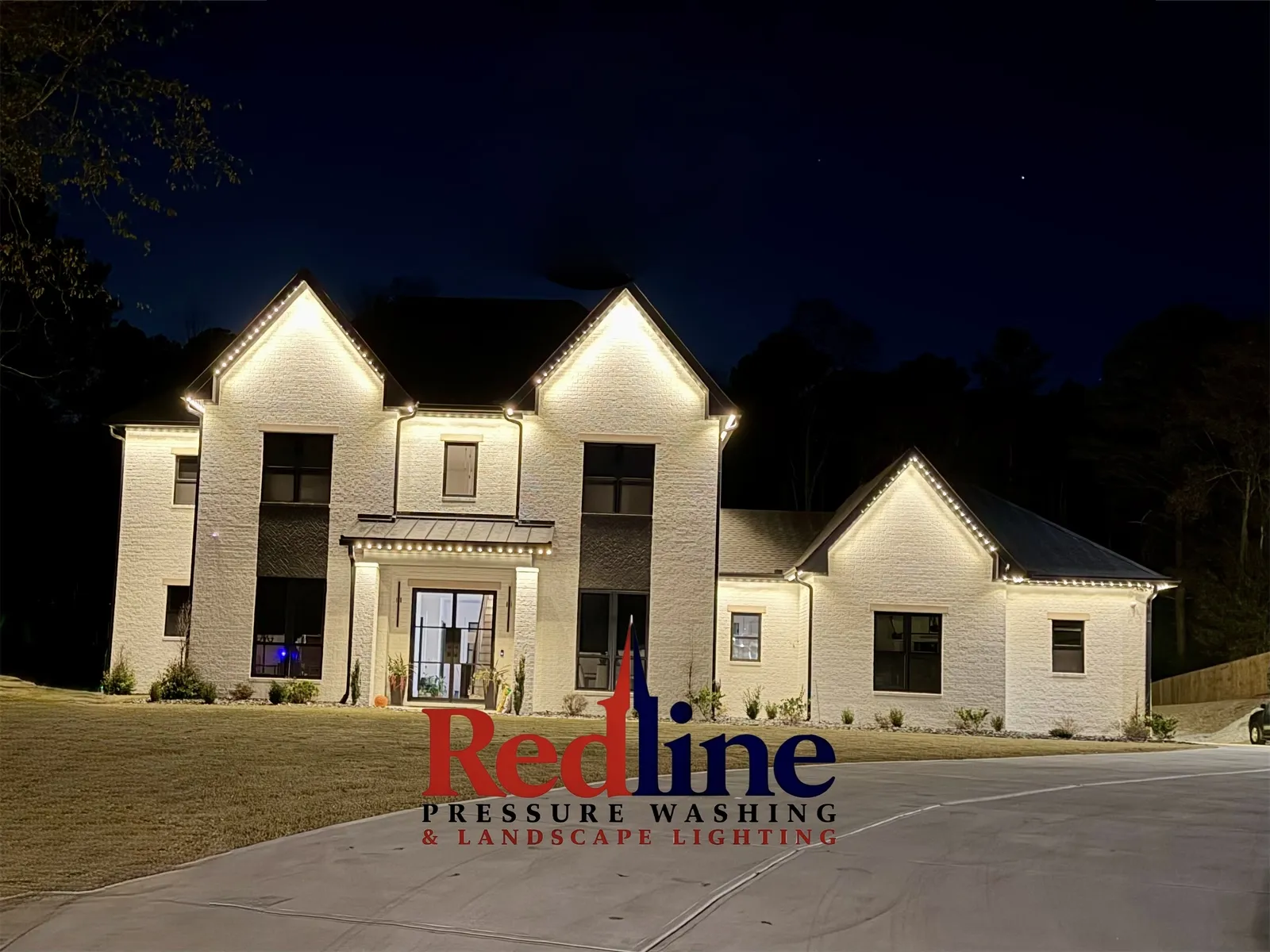 A professional pressure washing service in action, revitalizing the exterior of a home in Flowery Branch, GA.