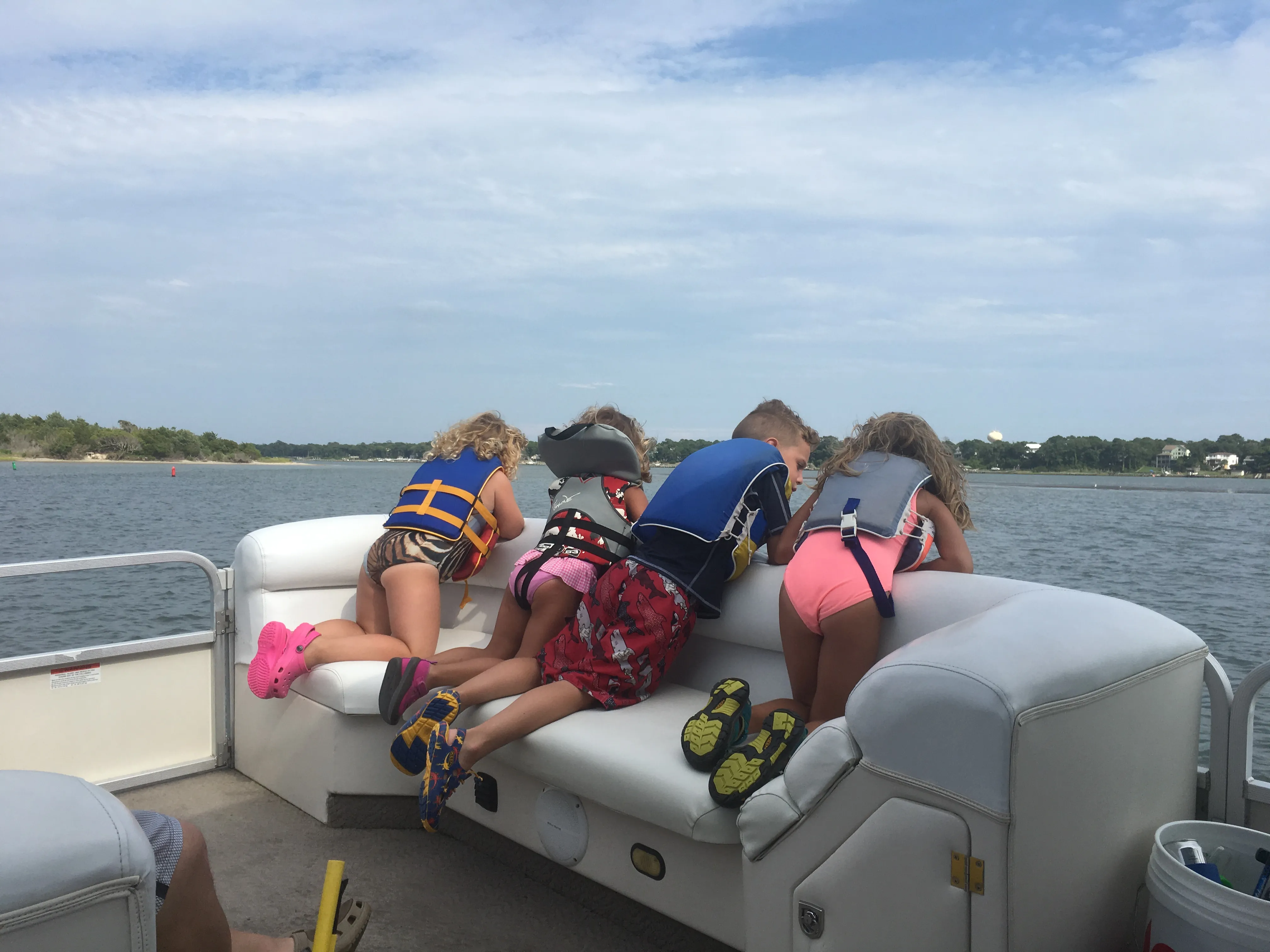 Kids participating in a fun, hands-on STEAM activity at the beach.