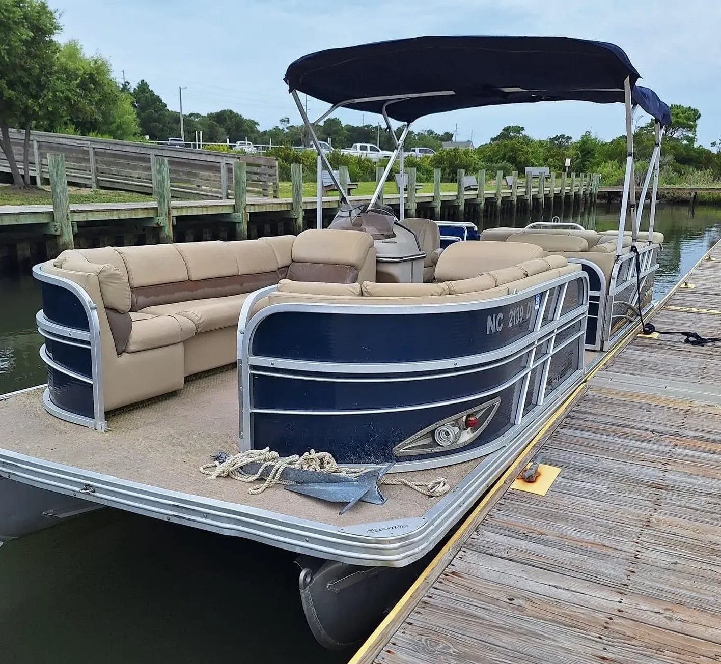 A captained boat rentals departing from Jacksonville, NC, with a group enjoying the ride in Jacksonville, NC for the whole family.